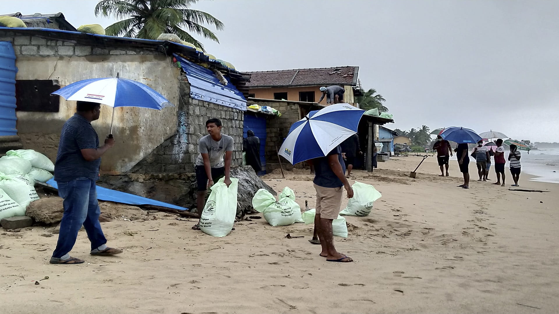 Image for the title: Sri Lanka evacuates thousands as Cyclone Burevi nears 