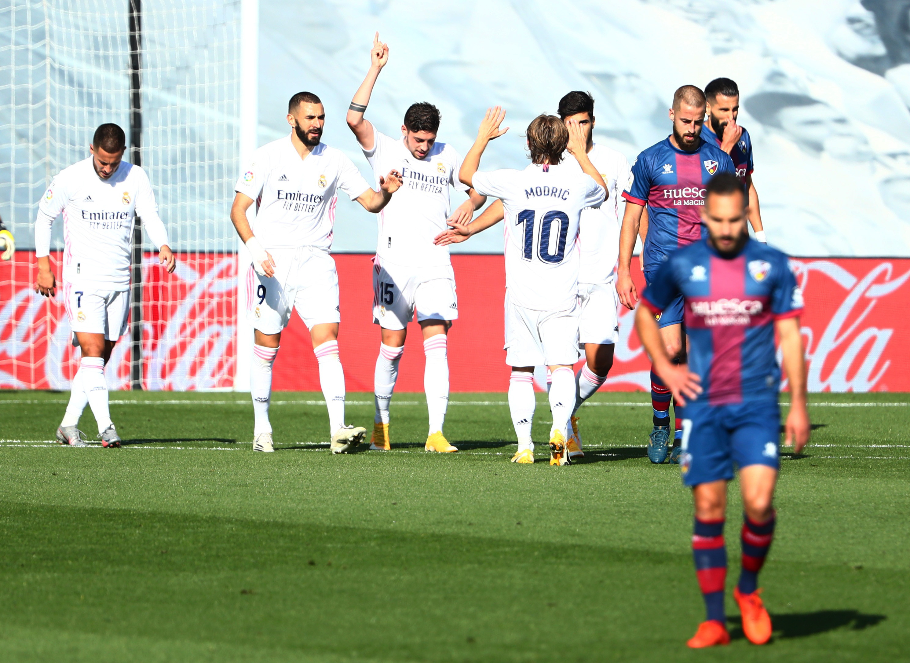 Image for the title: Hazard finally scores again as Madrid take care of Huesca 