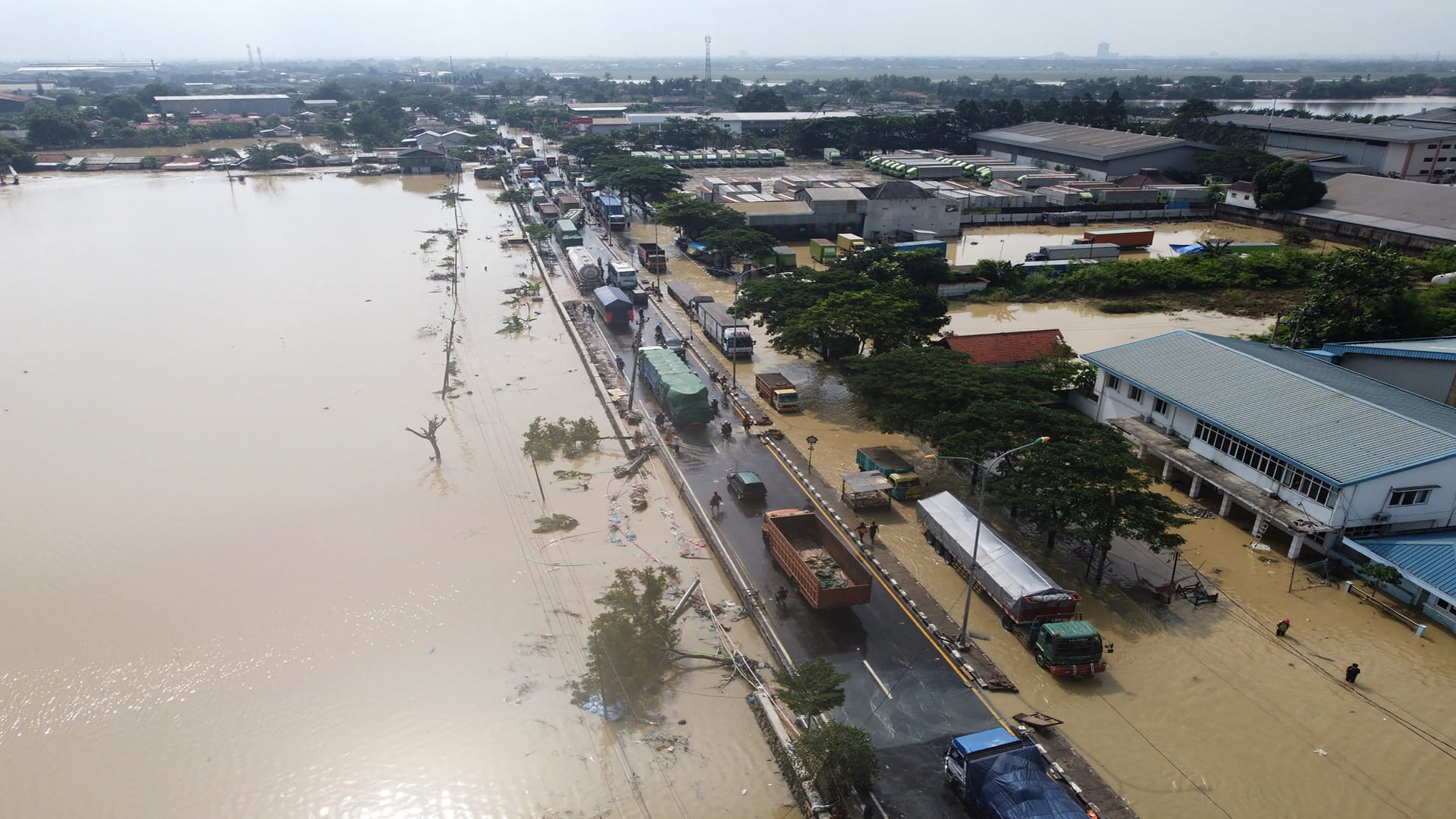 Image for the title: Floods, landslides, kill dozens in Indonesia and East Timor 