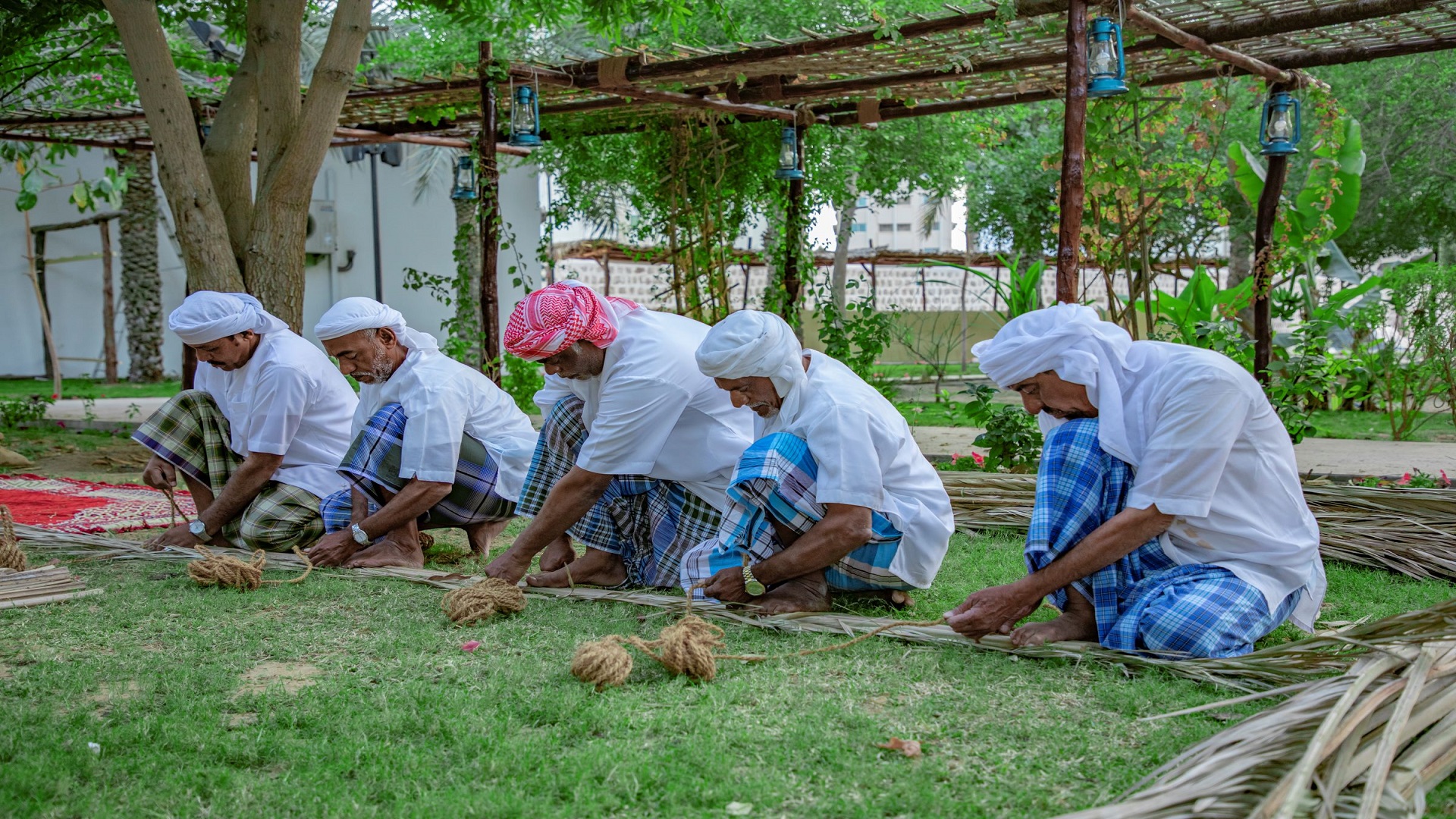 Image for the title: Daan craftsmen showcase art of making palm to build old houses 