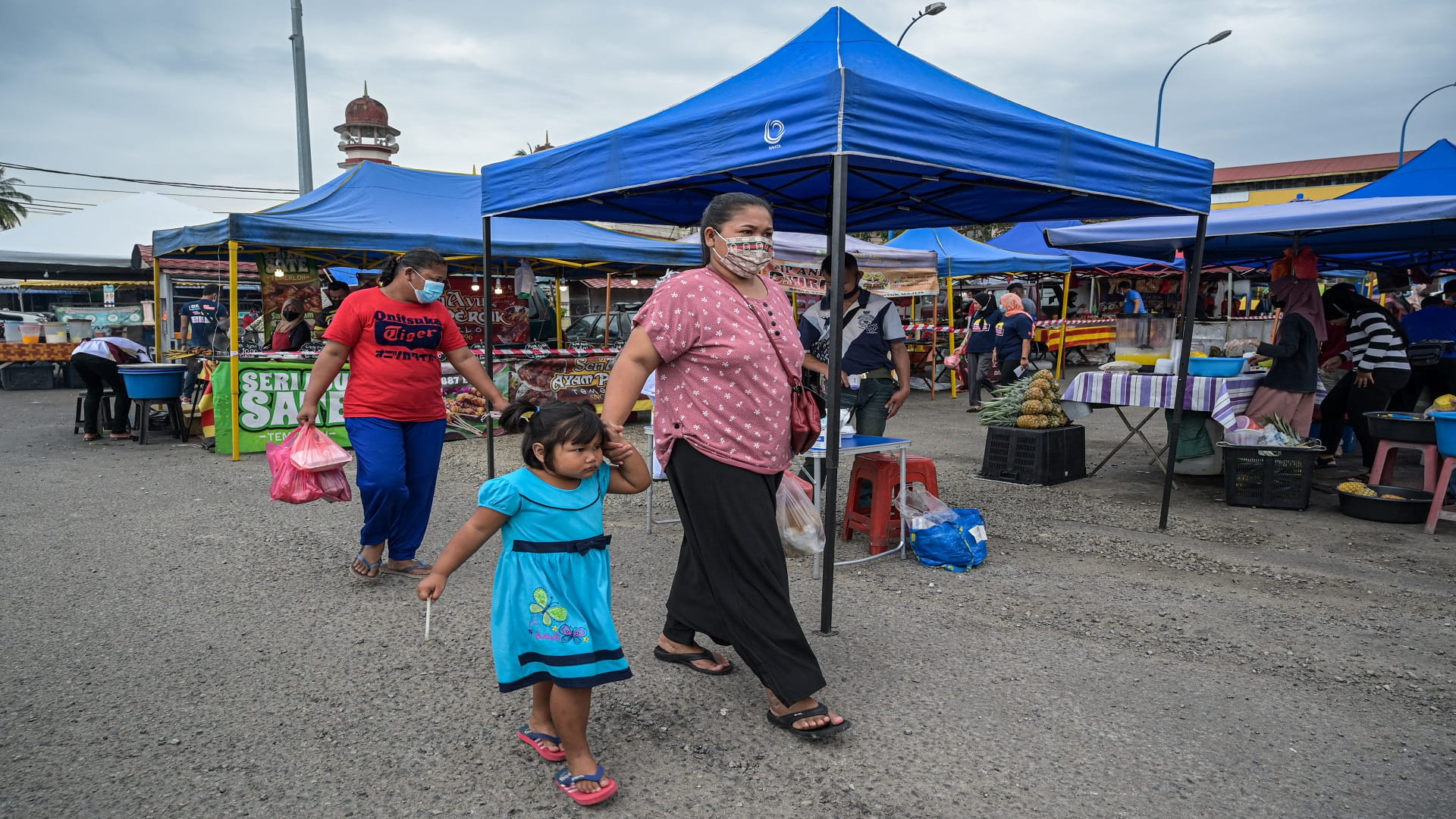 Image for the title: Malaysia reports 2,176 new virus cases, 10 deaths 