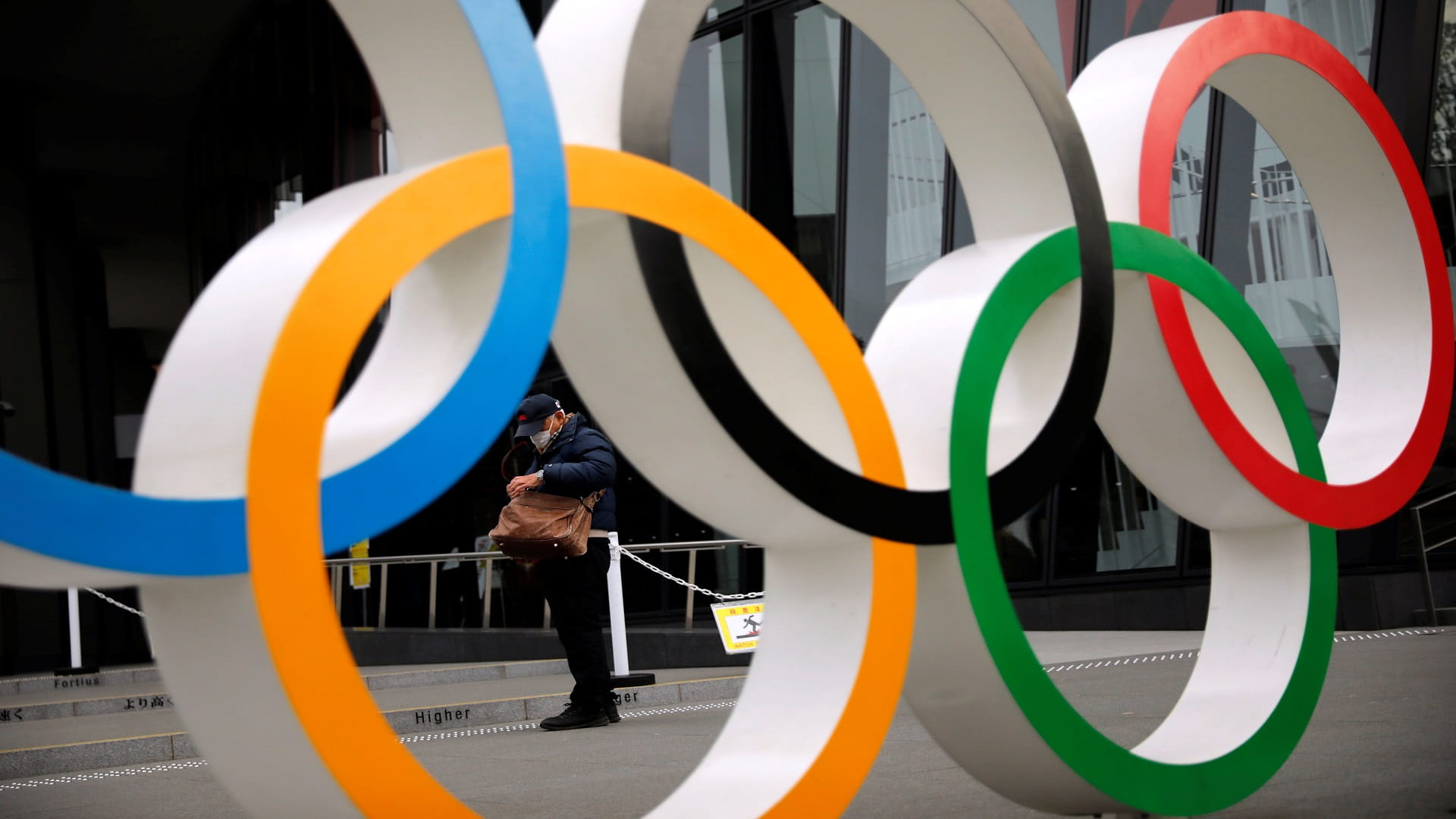 Image for the title: Tokyo 2020 organisers warn against gatherings during torch relay 