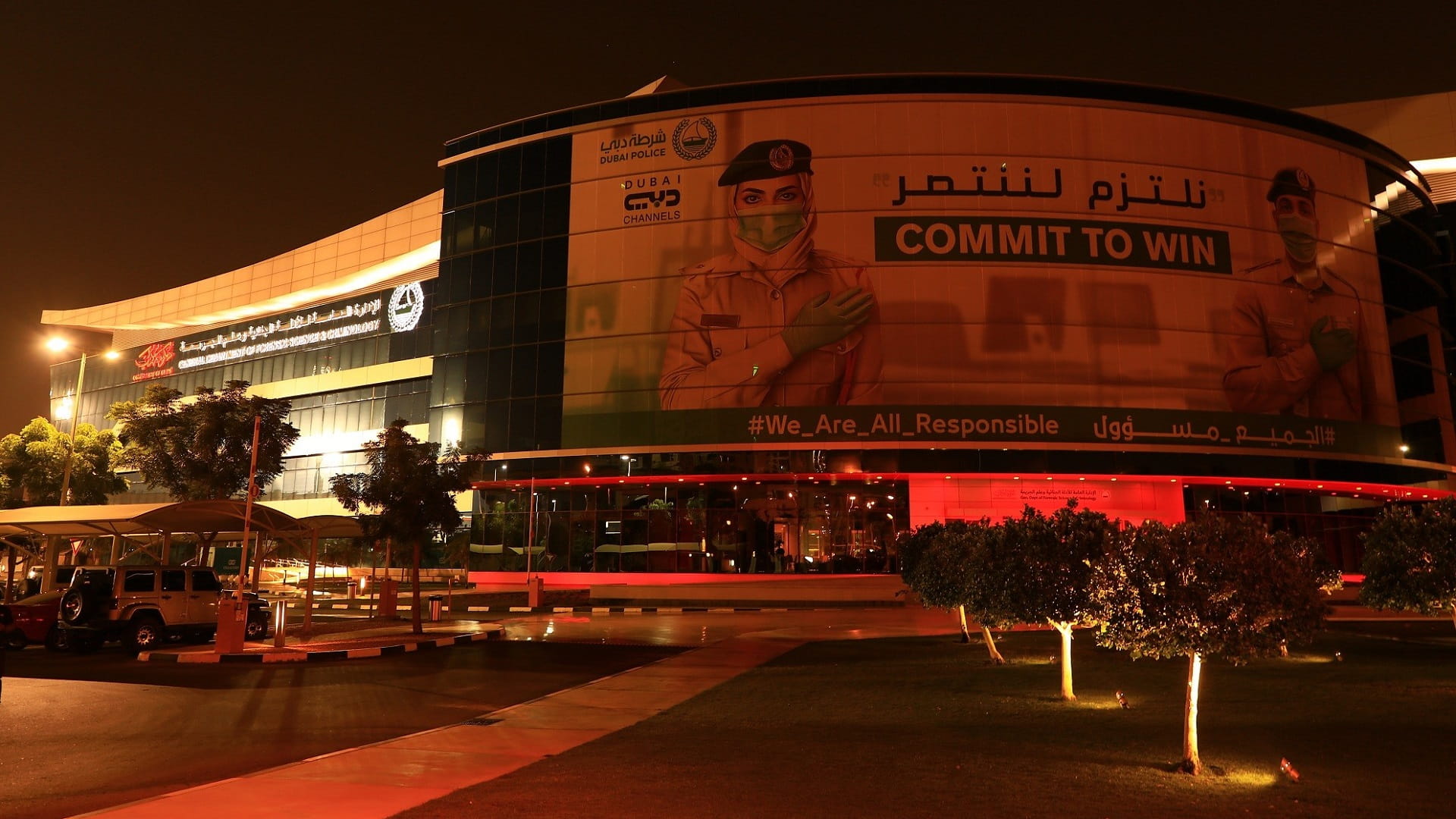 Image for the title: Dubai Police buildings glow red for Hope Probe 