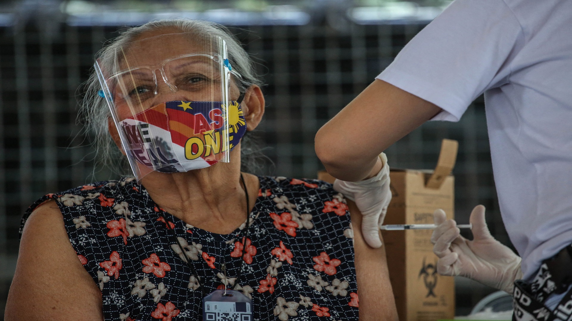 Image for the title: Philippines to give vaccinated elderly more freedom 