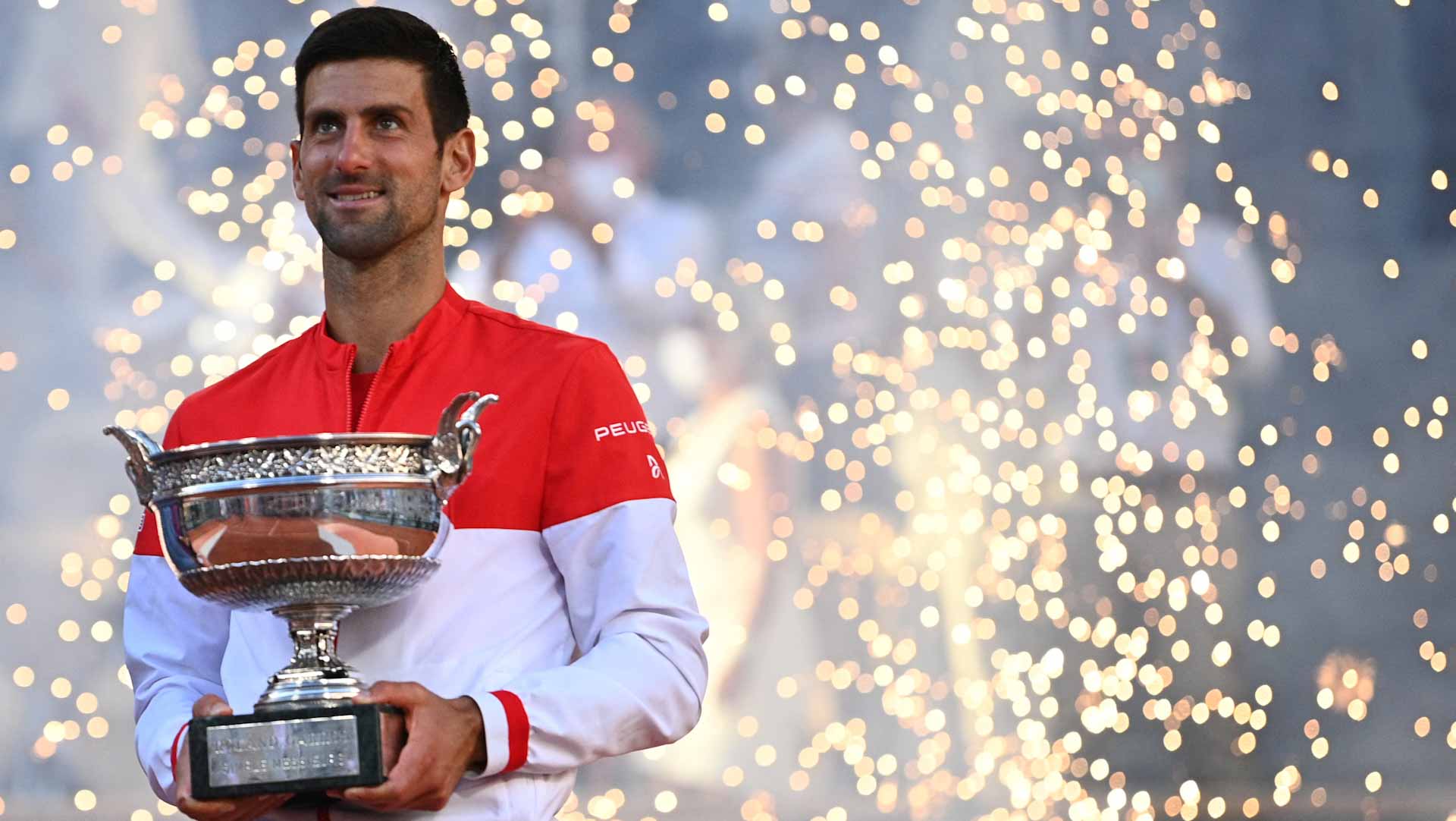 Image for the title: Djokovic beats Tsitsipas to win French Open title 