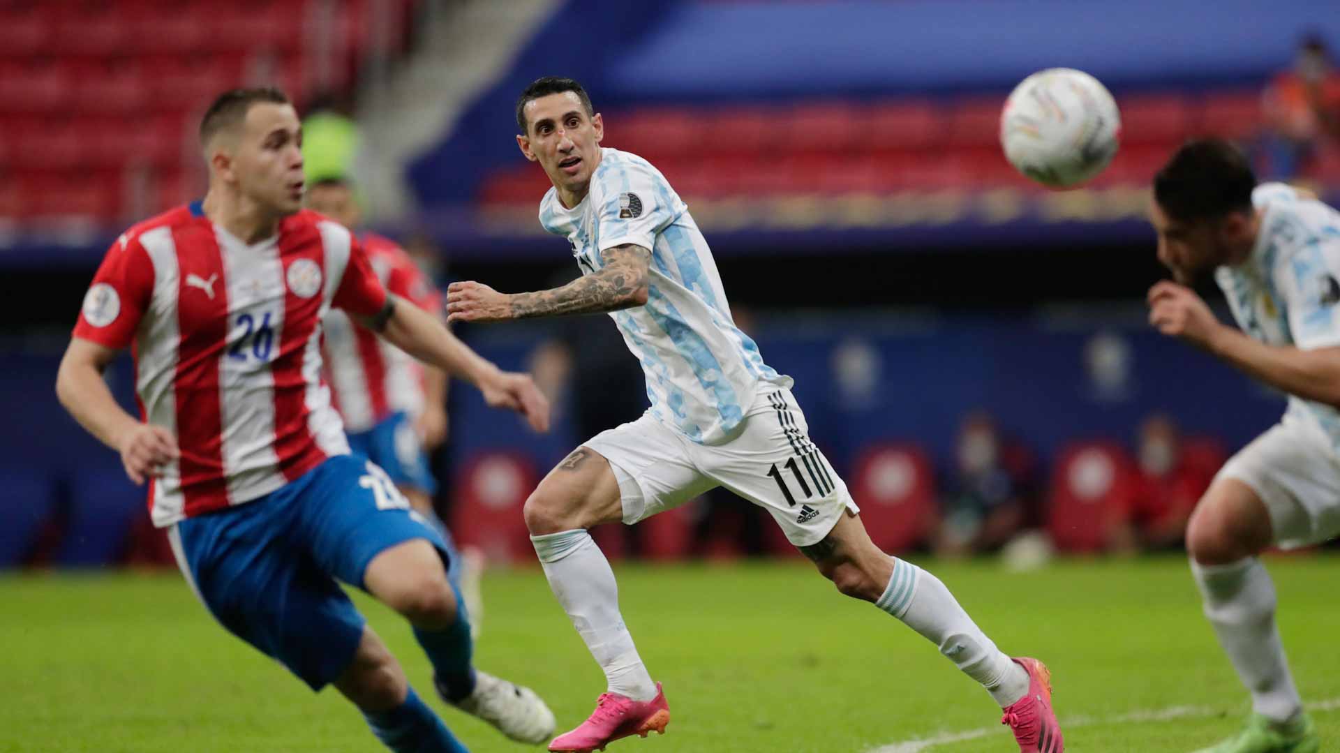 Image for the title: Argentina qualify for Copa quarters with win over Paraguay 