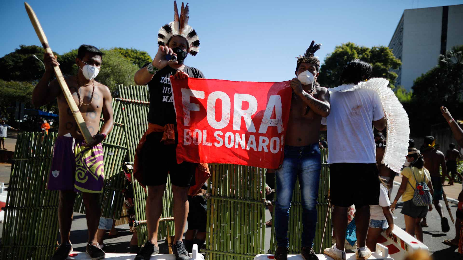 Image for the title: Police tear gas indigenous protest for land rights in Brazil 