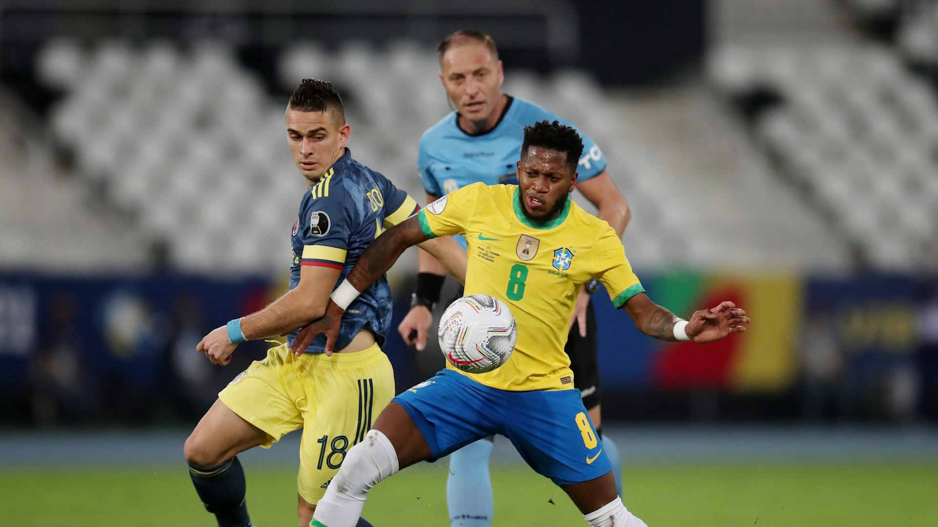 Image for the title: Late goal gives Brazil controversial 2-1 win over Colombia 