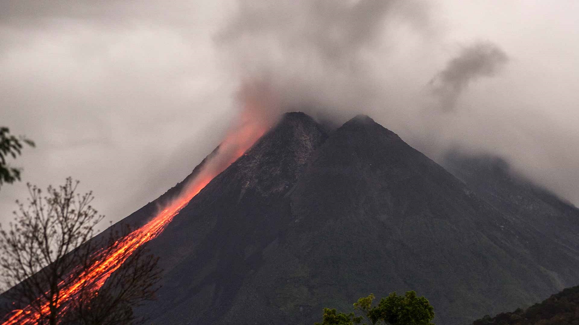 Image for the title: Indonesia's Merapi Volcano ejects hot clouds 