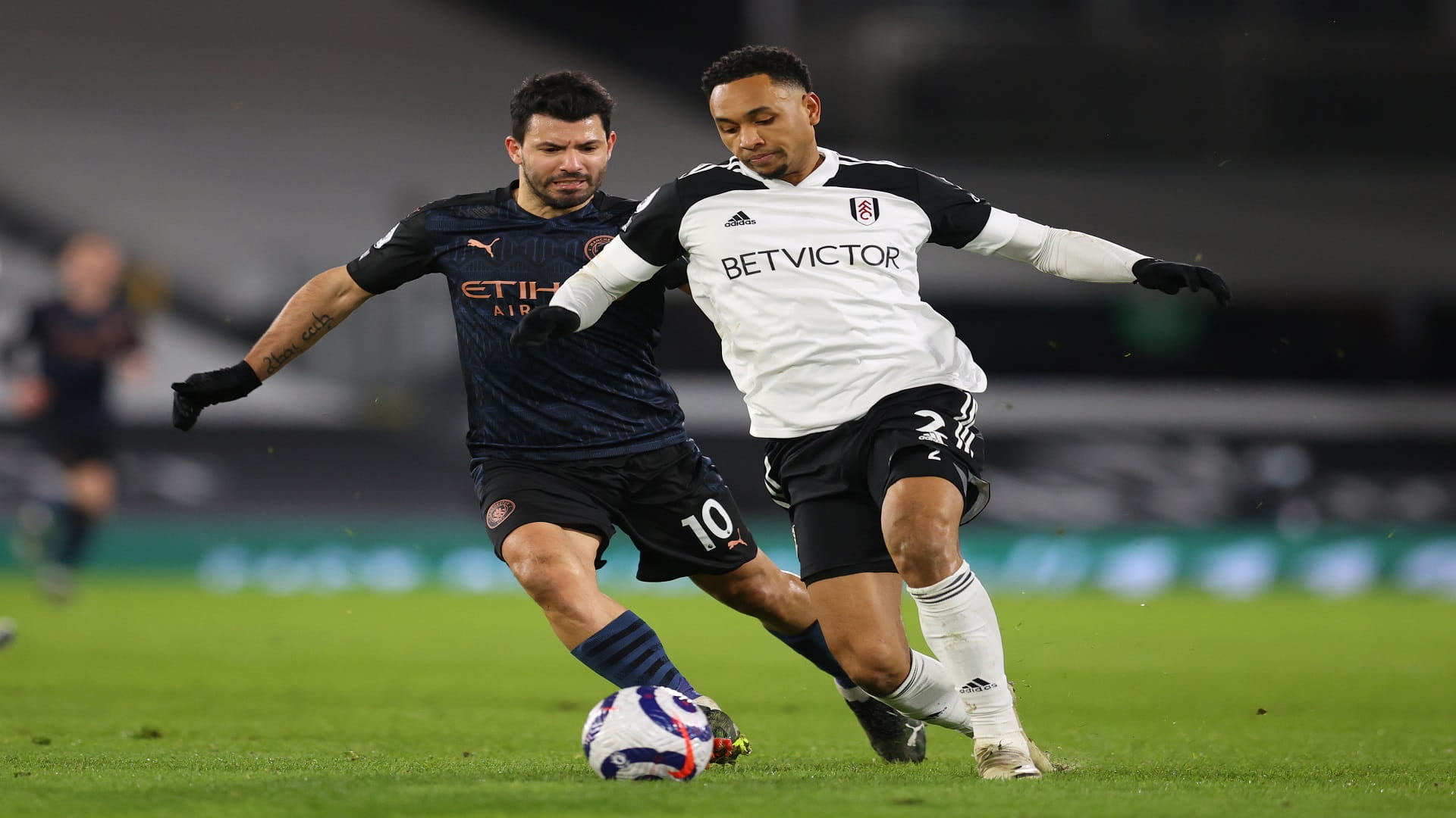 Image for the title: Aguero back on scoresheet as Man City brush Fulham aside 