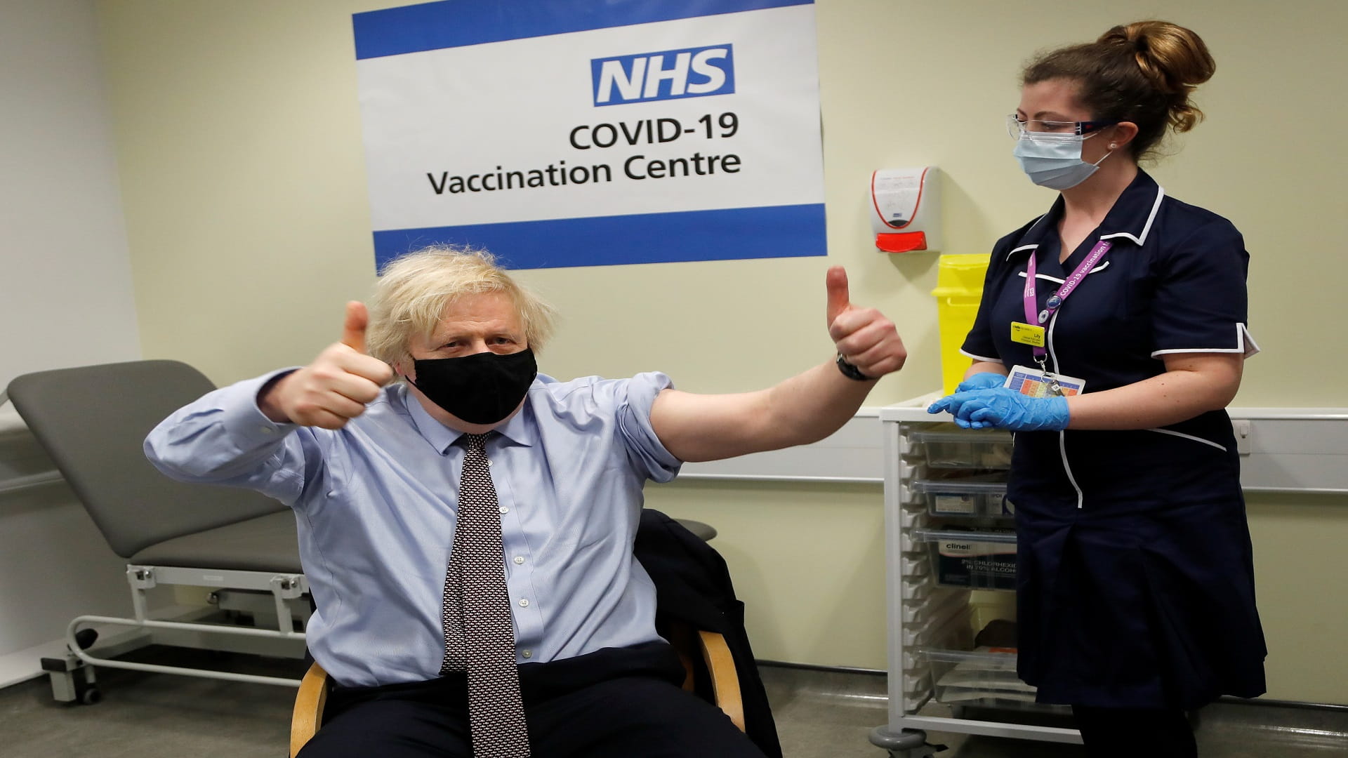 Image for the title: UK PM Johnson gets his first dose of AstraZeneca vaccine 