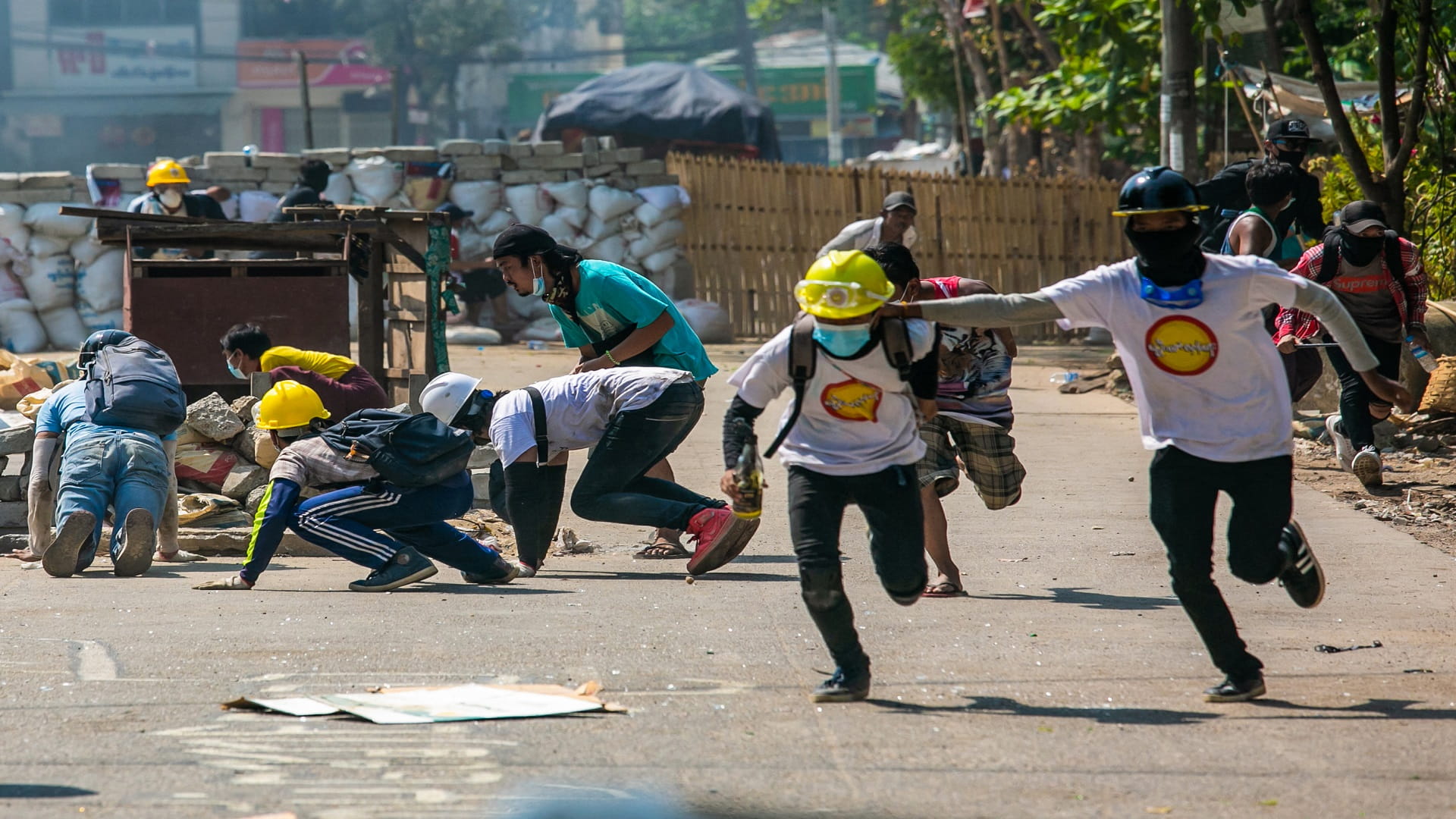 Image for the title: Myanmar protesters voice defiance under cover of the night 