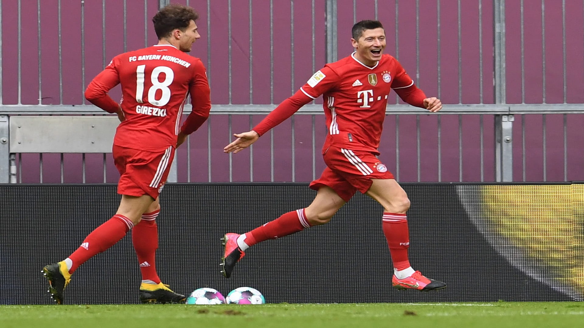 Image for the title: Lewandowski hits treble as 10-man Bayern run riot 