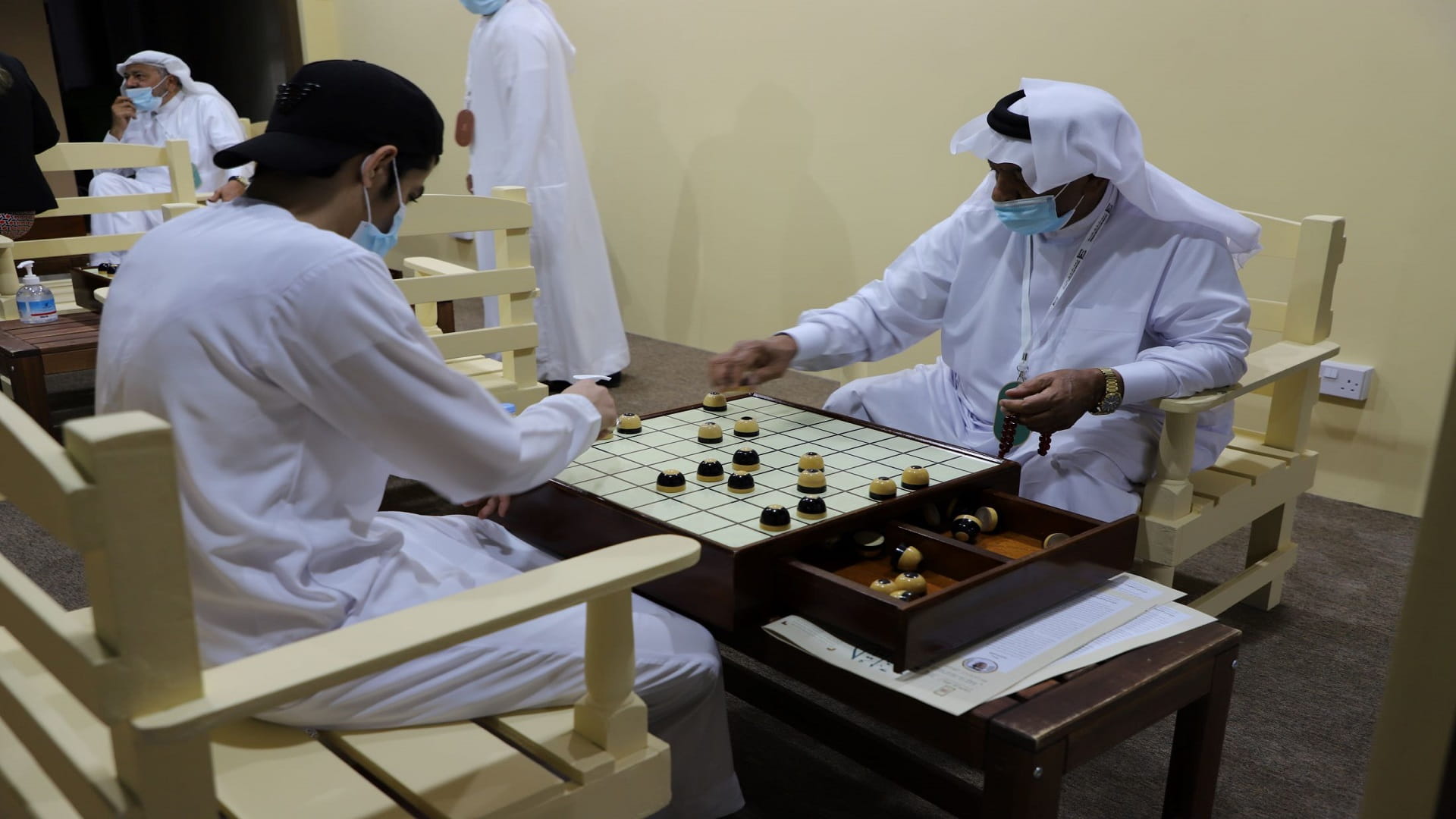 Image for the title: SHD teaching young Emiratis tactics and strategy  