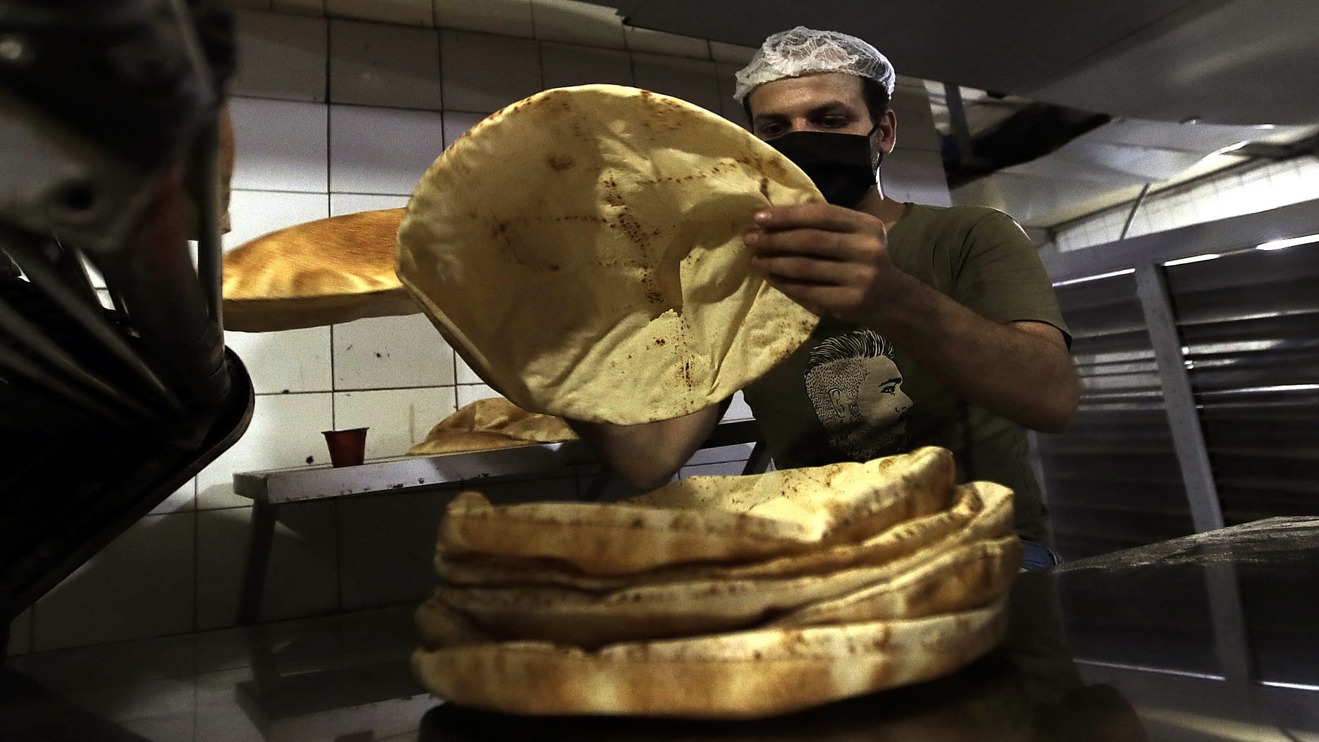 Image for the title: Lebanon hikes bread price for third time in nine months 