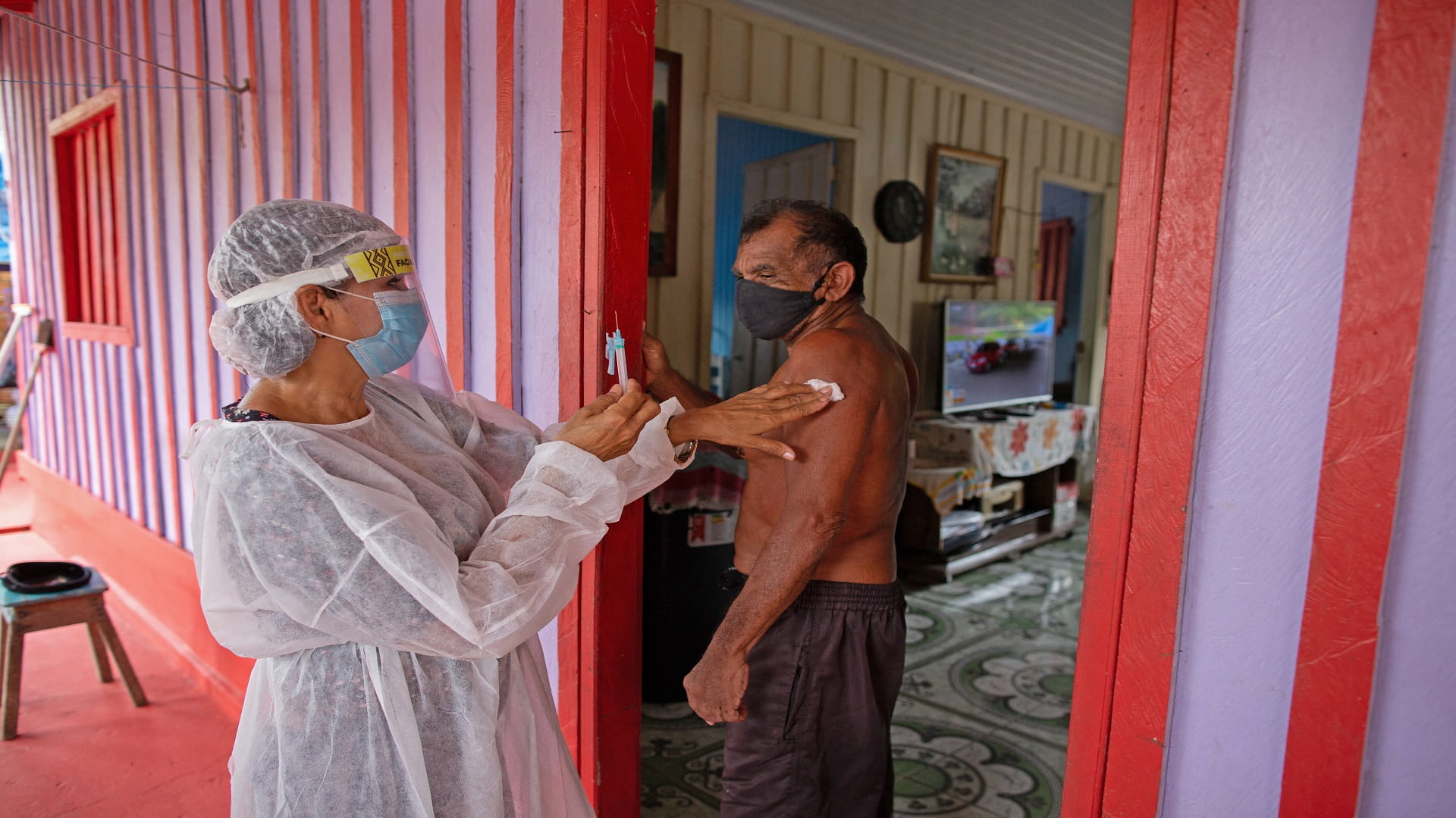 Image for the title: Brazil sees record COVID-19 deaths 