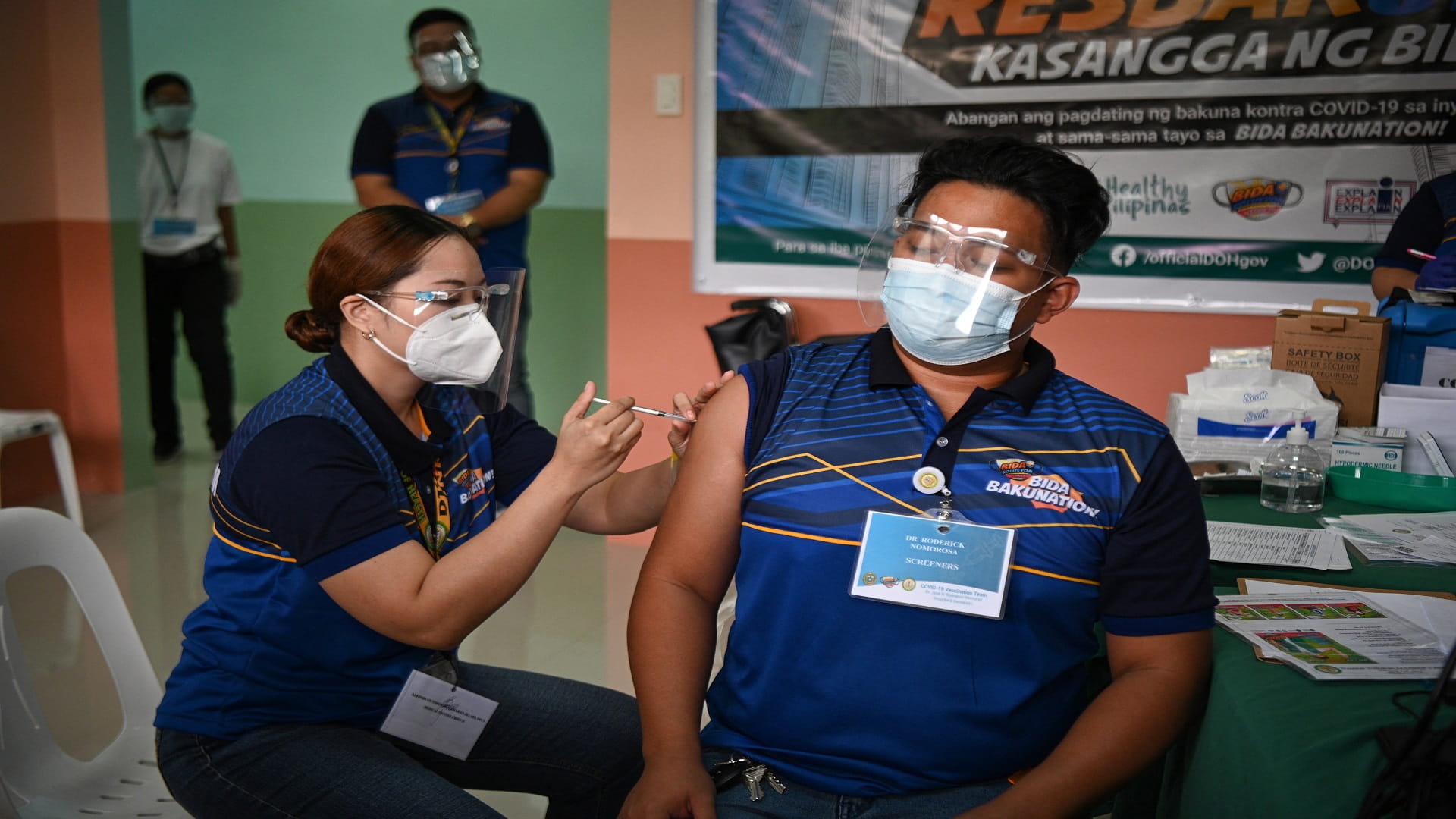 Image for the title: Philippines reports record high 8,773 new coronavirus infections 