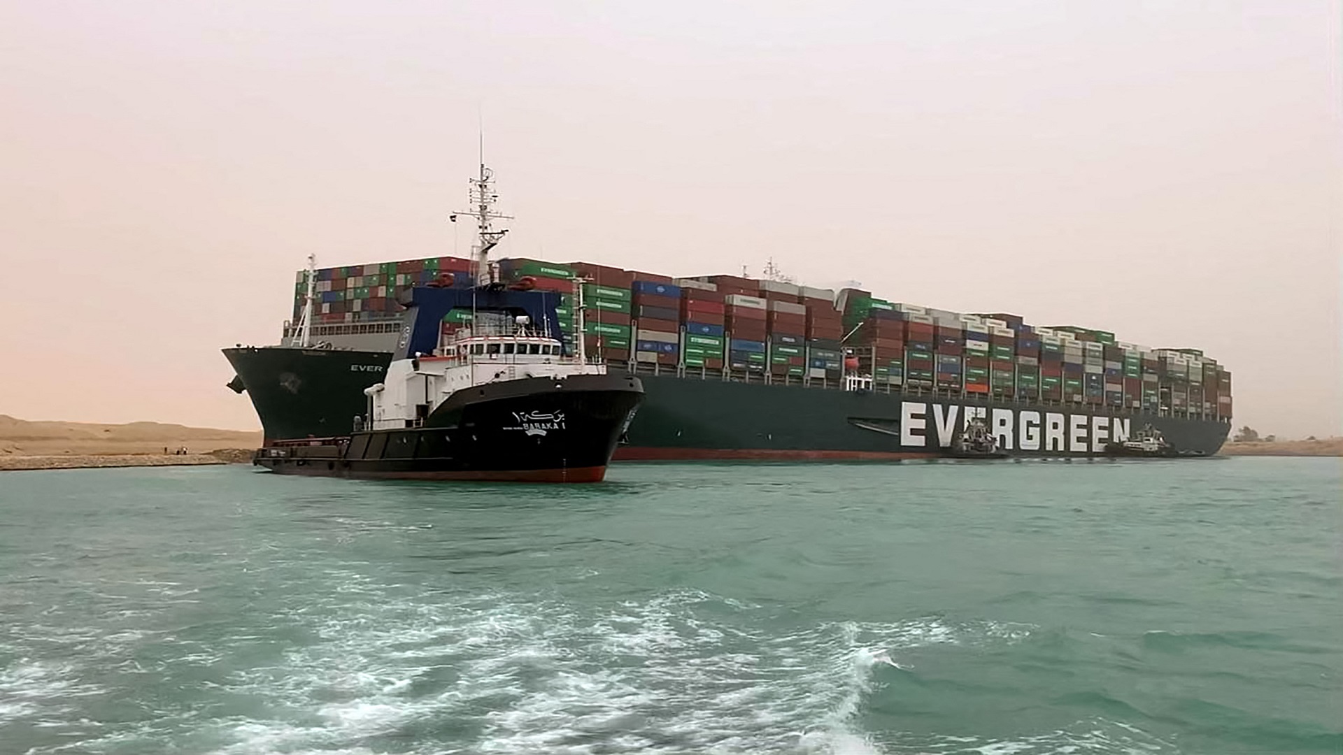 Image for the title: Suez Canal halts traffic in final push to dislodge supertanker 