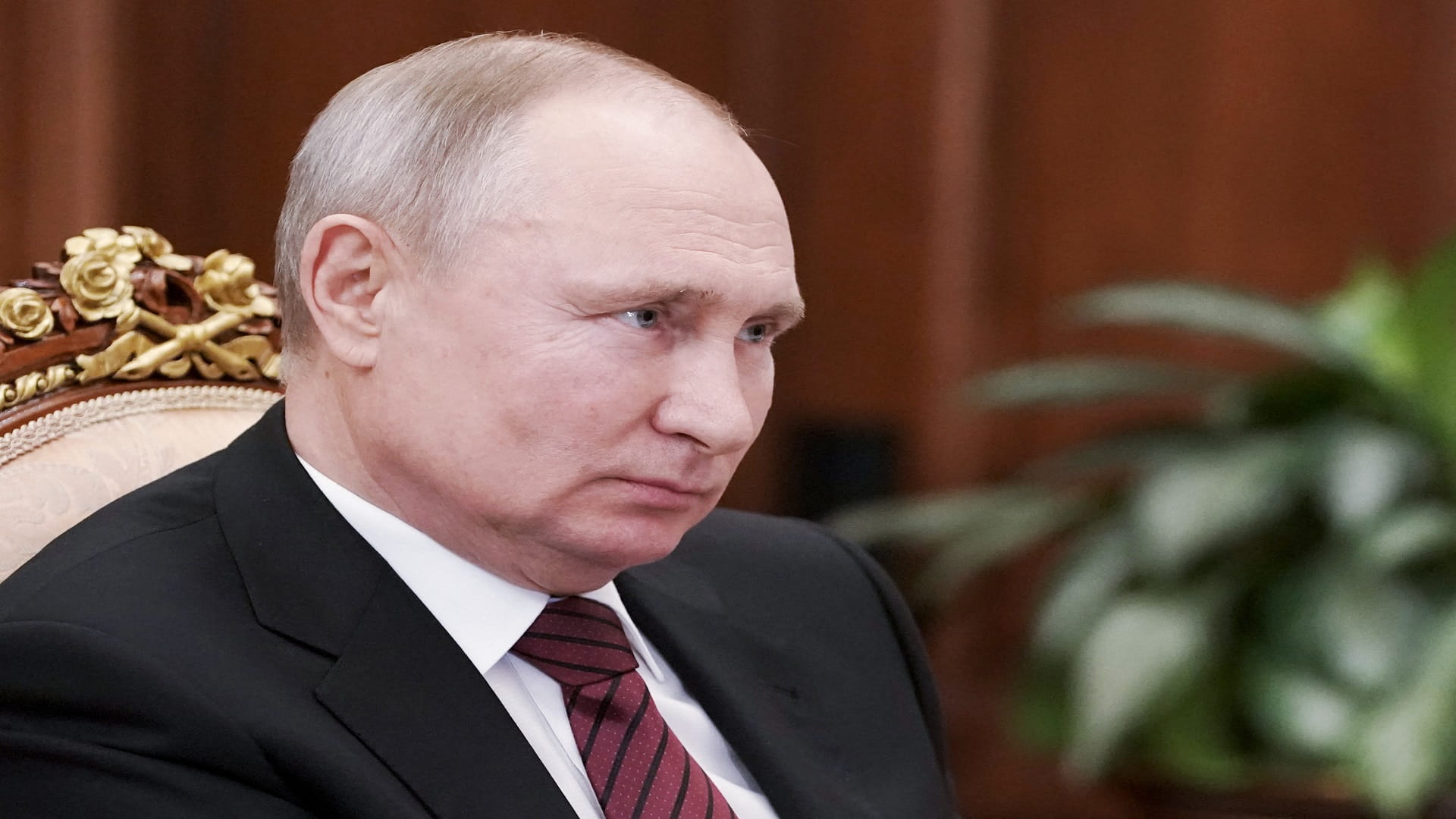 Image for the title: Putin vows response after ally probed for treason in Ukraine 