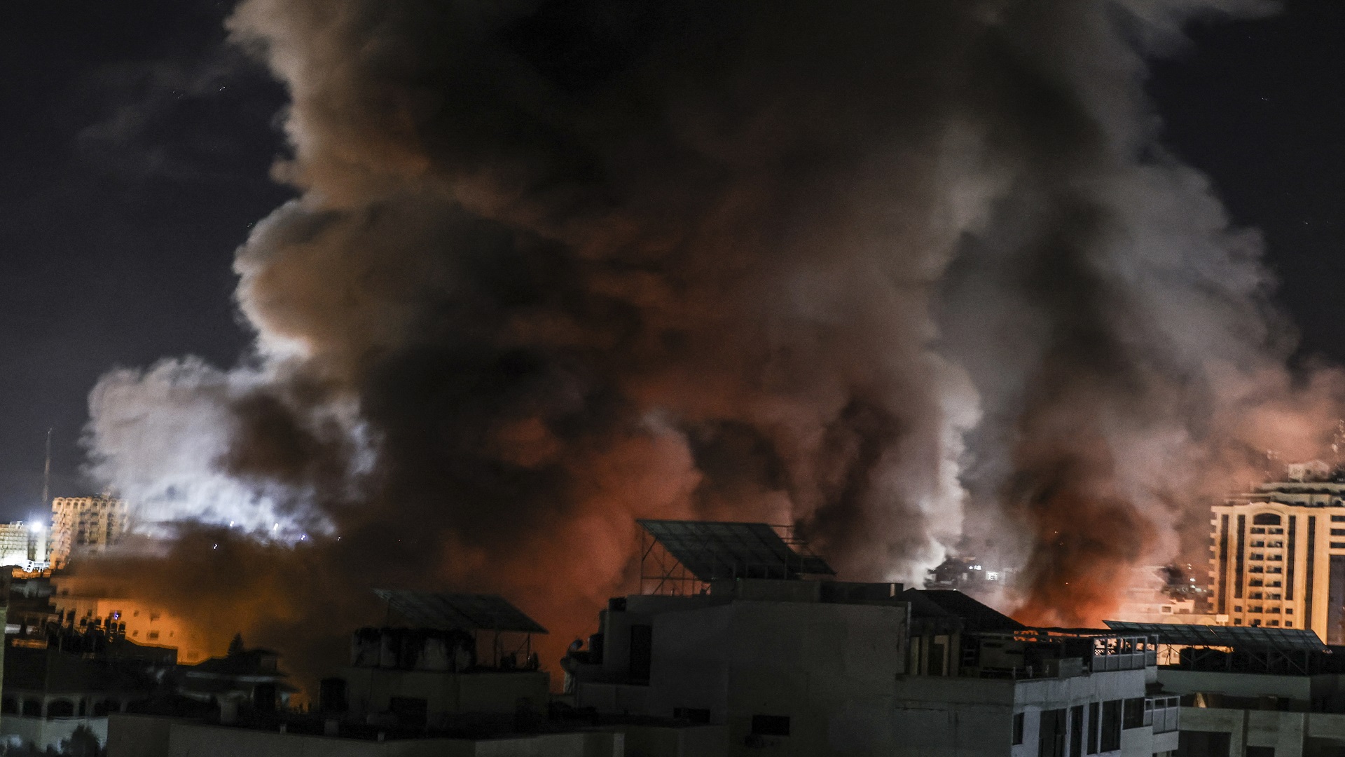 Image for the title: Gaza reels under Israeli strikes as violence enters second week 