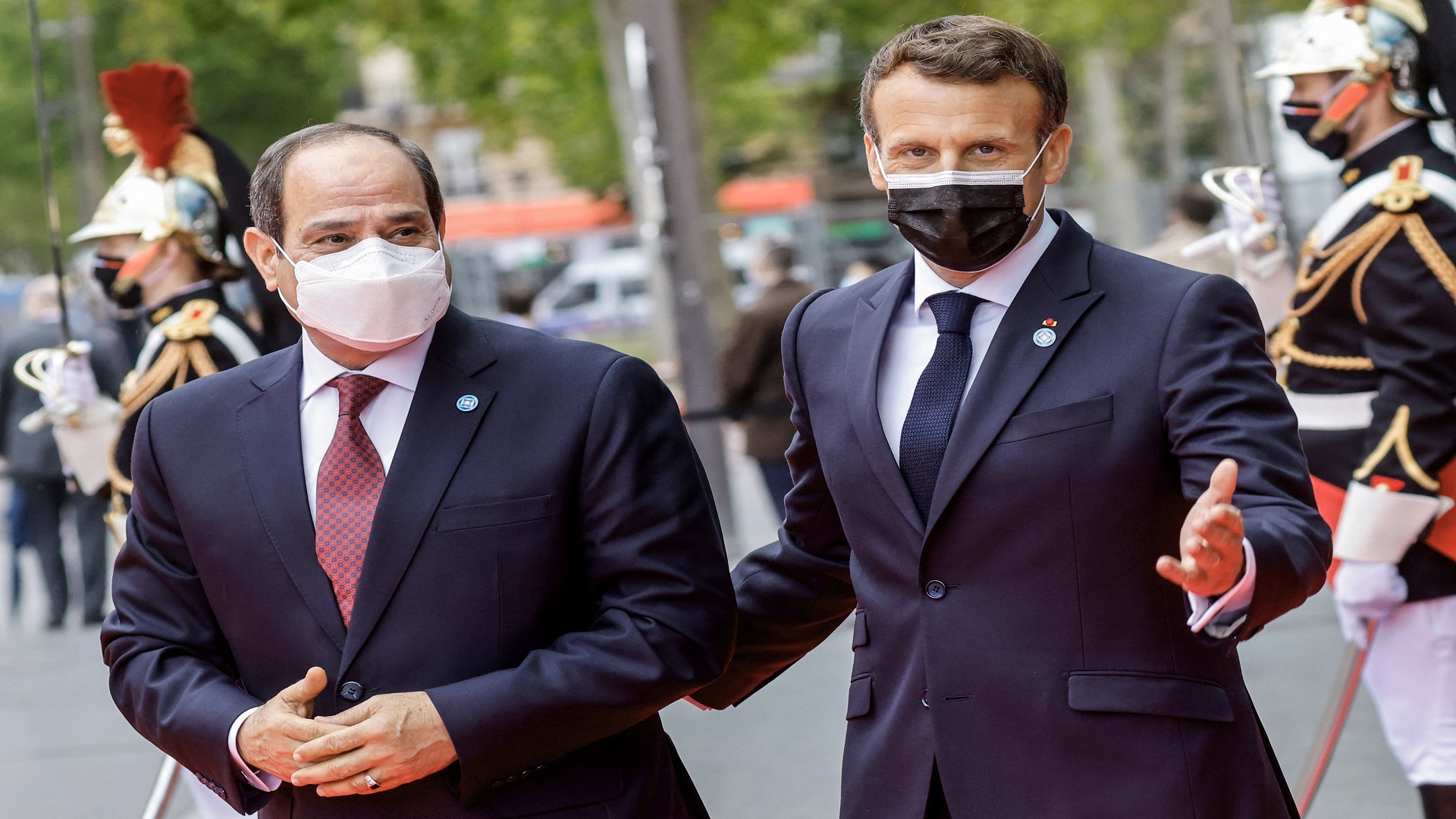 Image for the title: Macron, Egypt's Sisi, Jordan king to seek Mideast ceasefire 