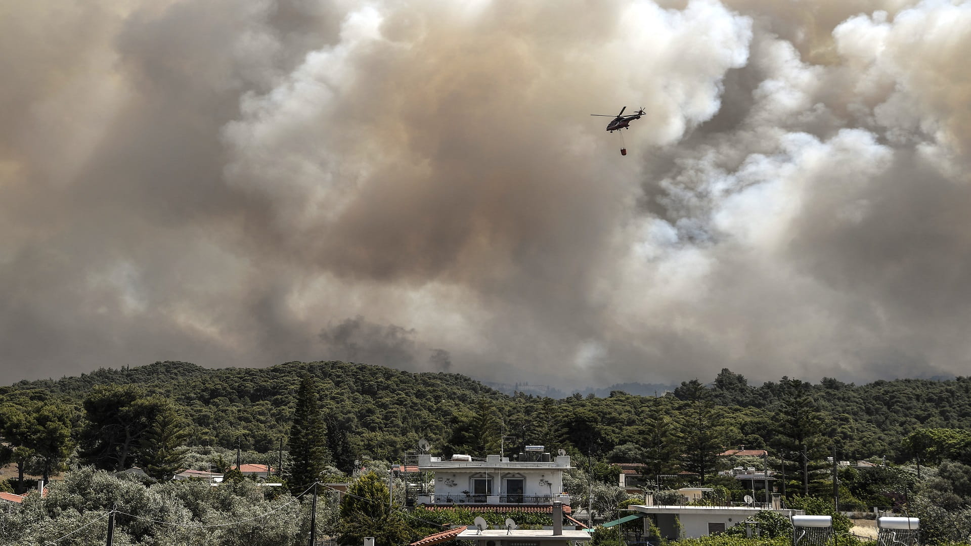 Image for the title: Greek villages evacuated as forest fire rages 