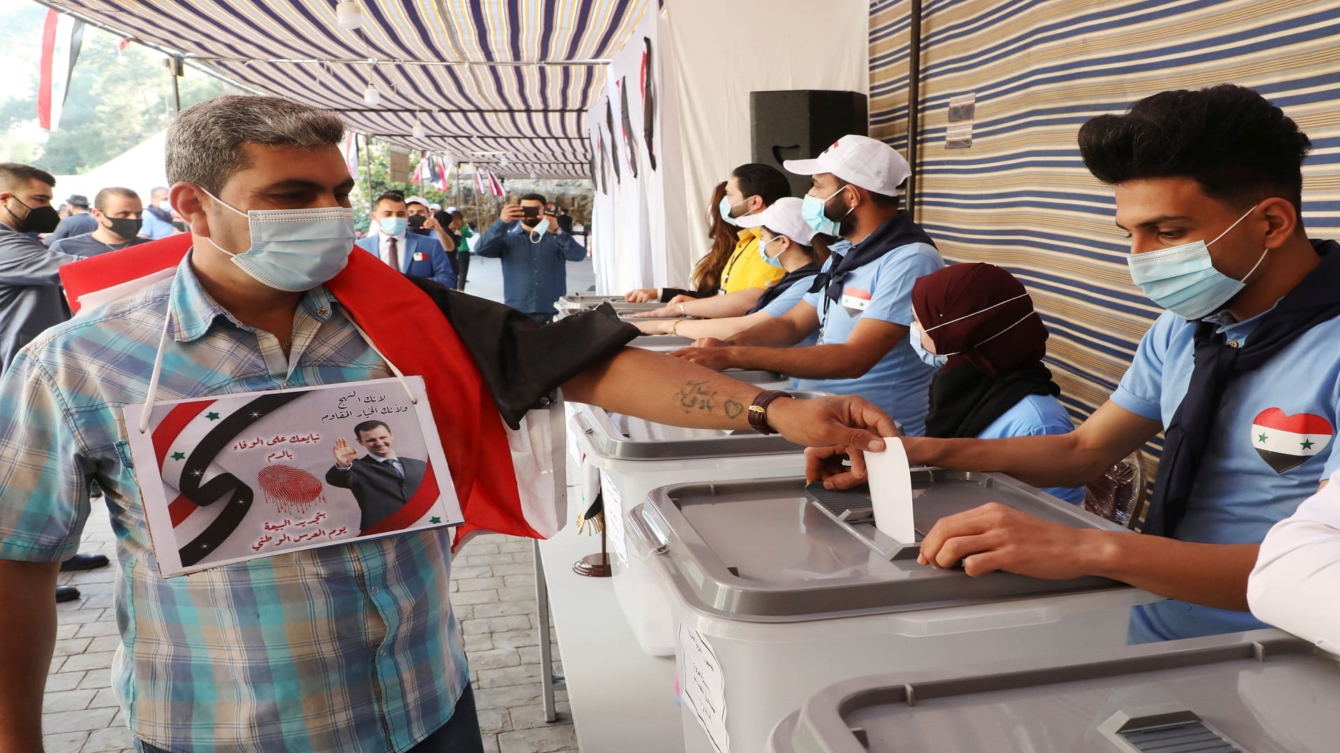 Image for the title: Syrians abroad start voting for presidential elections 