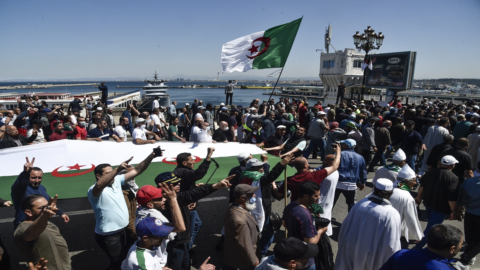 Image for the title: Algerian police swamp capital, quashing protest 