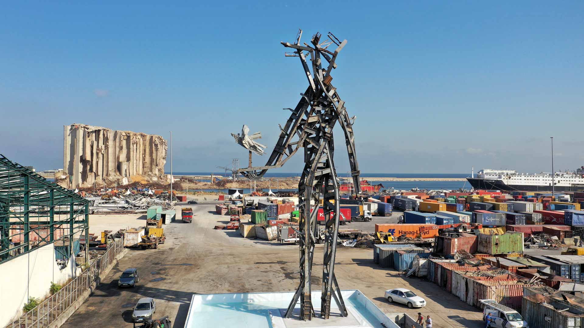 Image for the title: Memorial sculpture at Beirut port blast site draws mixed reviews 