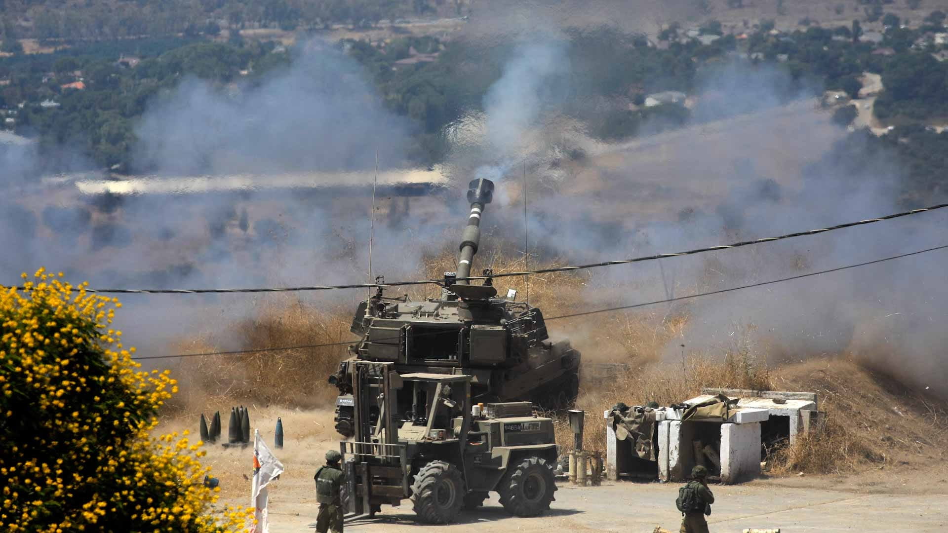 Image for the title: Rocket warning sirens sound in northern Israel 
