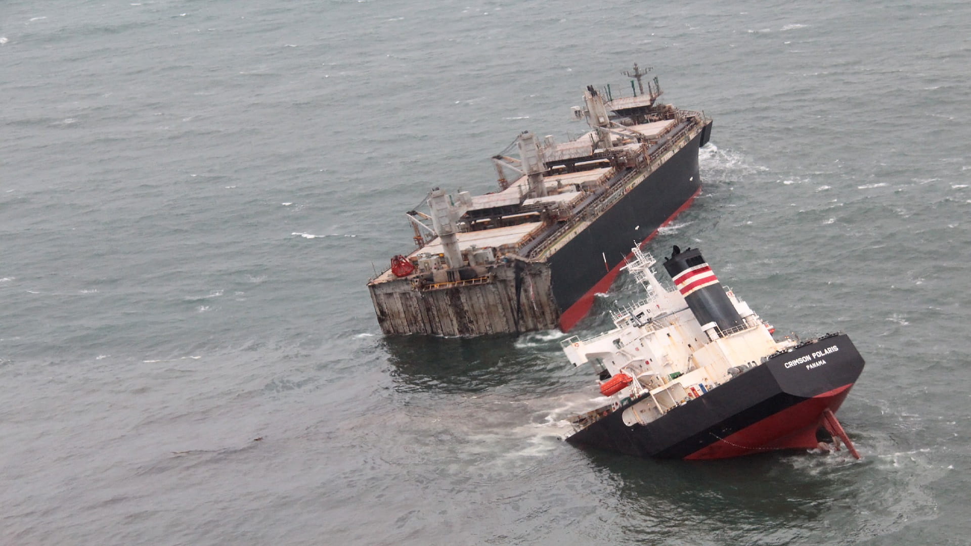 Image for the title: Cargo ship runs aground in Northern Japan, splits in two 