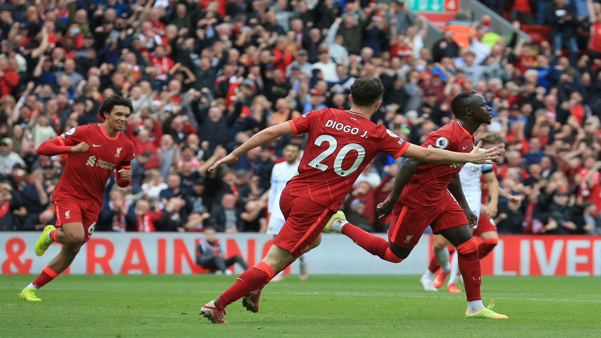 Image for the title: Liverpool beats Burnley 2-0 before full house at Anfield 