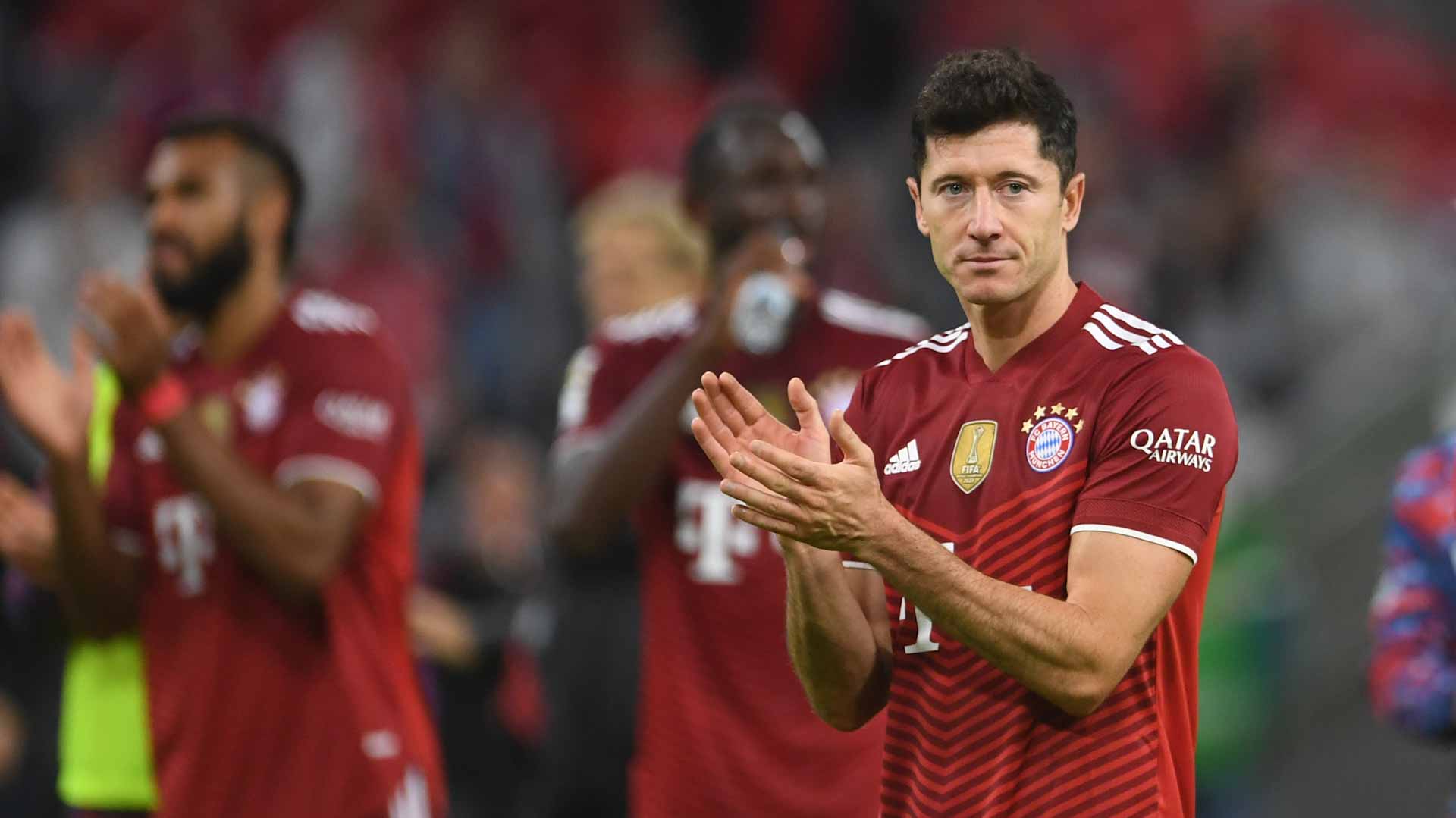 Image for the title: Lewandowski nets hat-trick as Bayern crush Hertha Berlin 