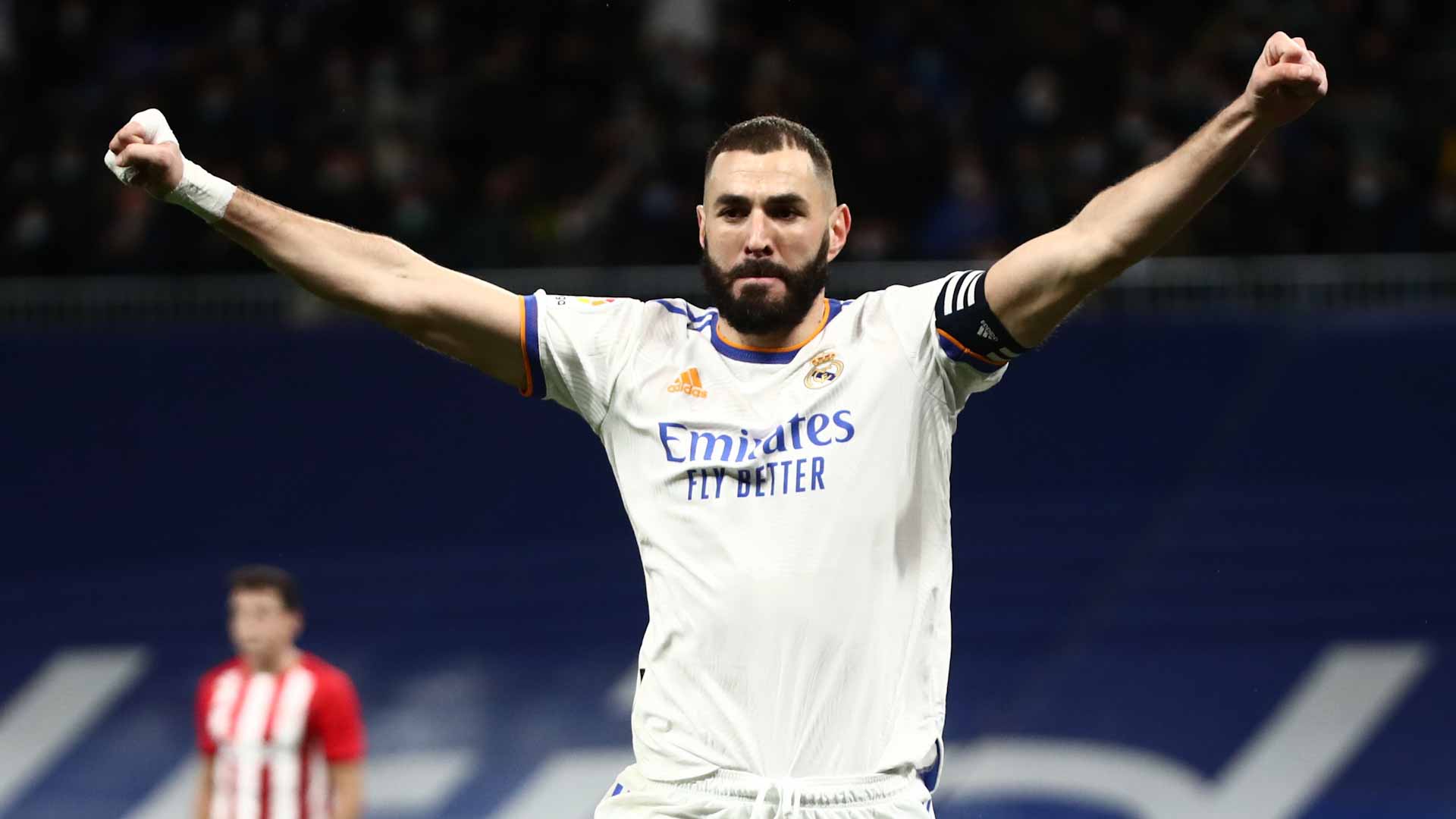 Image for the title: Benzema nets winner as Real extend LaLiga lead 