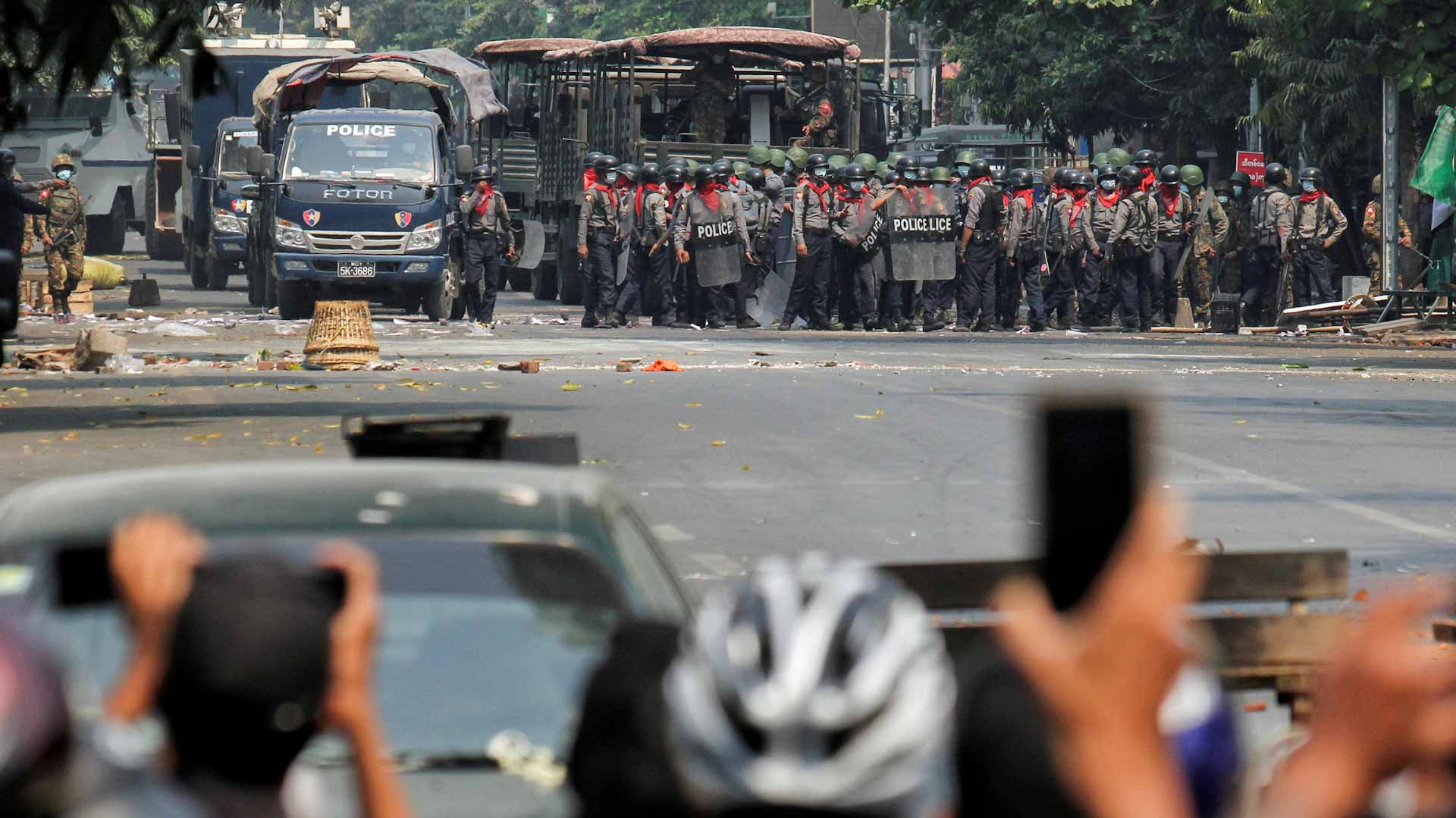 Image for the title: Five dead after Myanmar S.F ram car into Yangon protest 