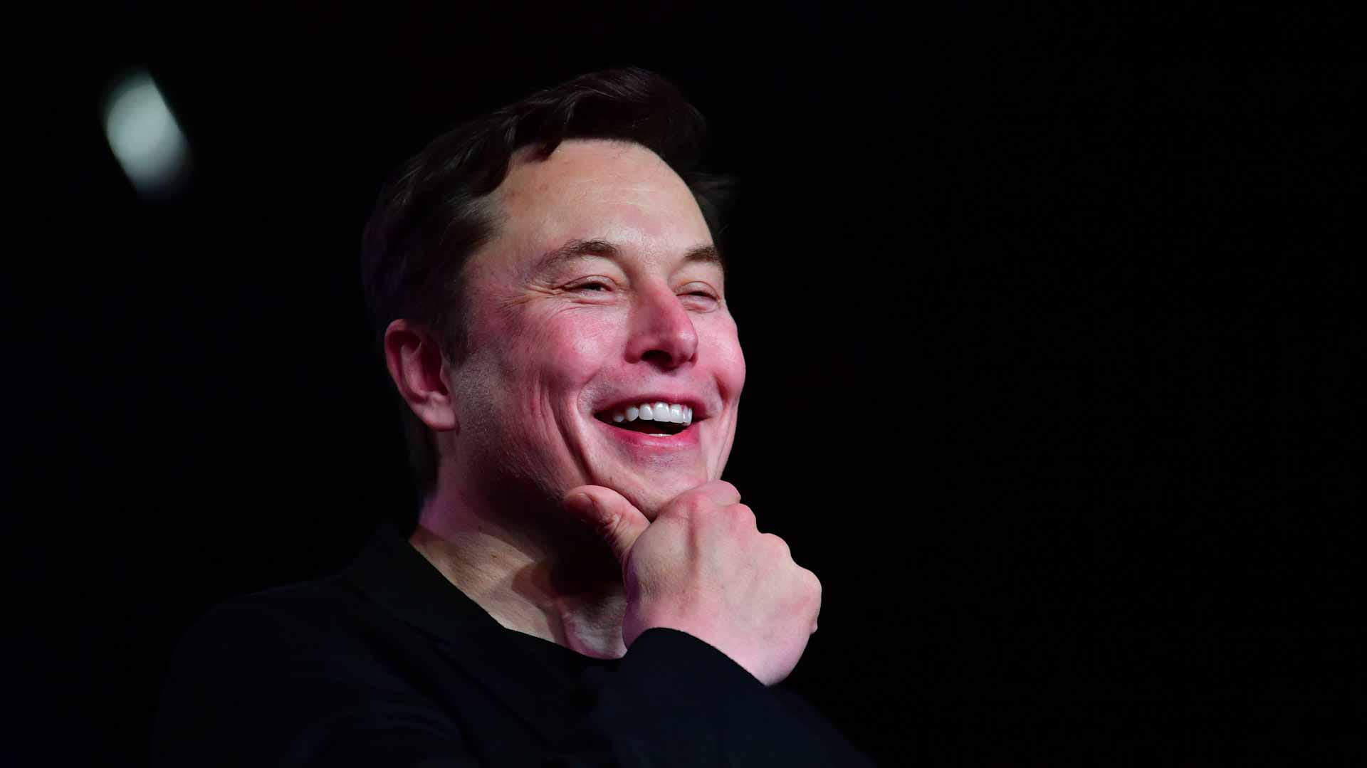 Image for the title: Musk says he is considering 'quitting' 