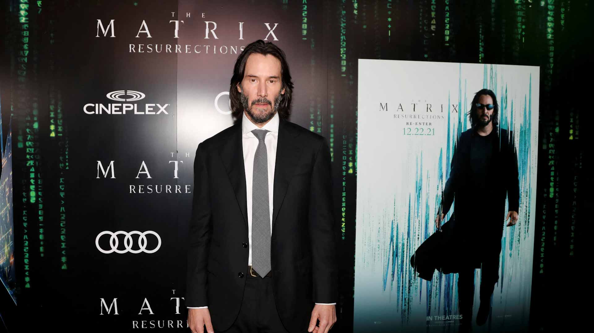 Image for the title: Keanu Reeves unveils new 'Matrix' film in Toronto 