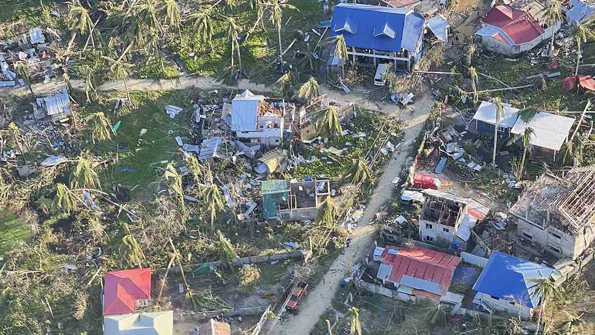 Image for the title: Death toll from Philippines typhoon passes 20 