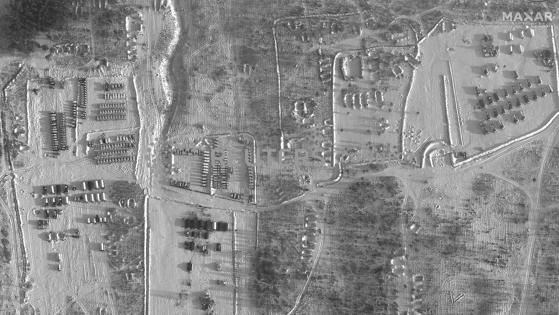 Image for the title: Satellite images show Russia still building up forces near Ukraine 