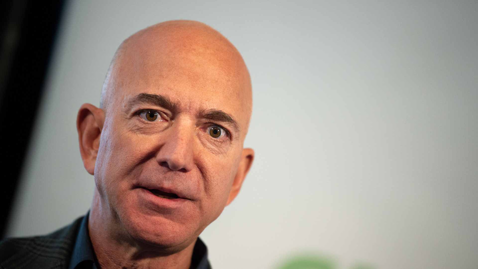 Image for the title: Bezos leaves enduring legacy as he steps away as Amazon CEO 