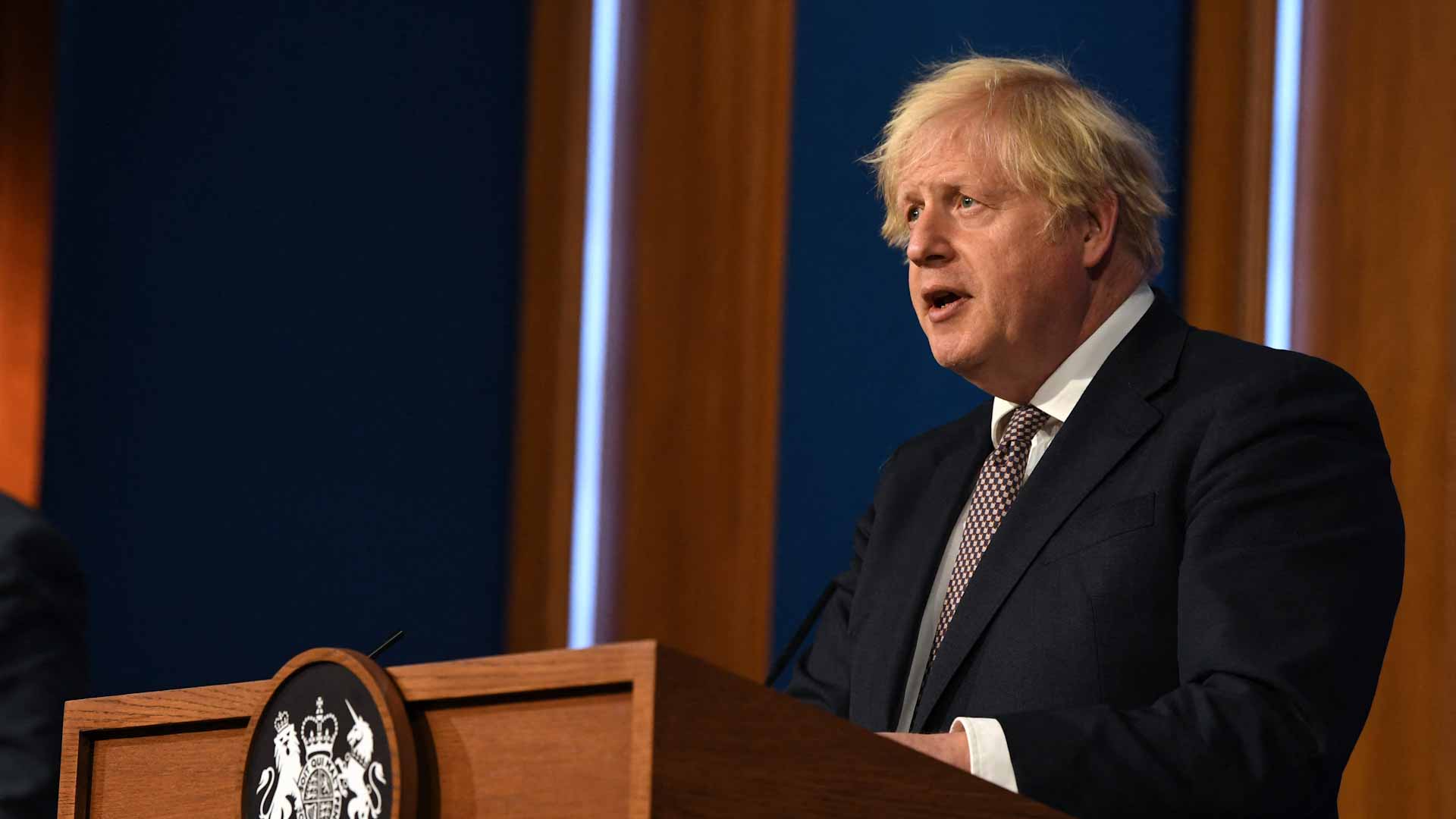 Image for the title: England set to lift virus restrictions despite soaring cases 
