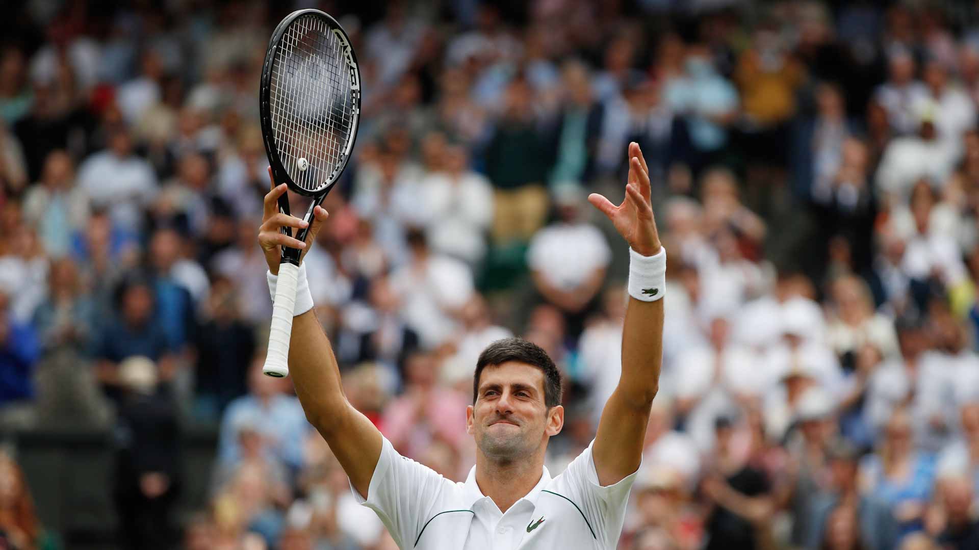 Image for the title: Djokovic rolls into Wimbledon quarters with Garin thrashing 