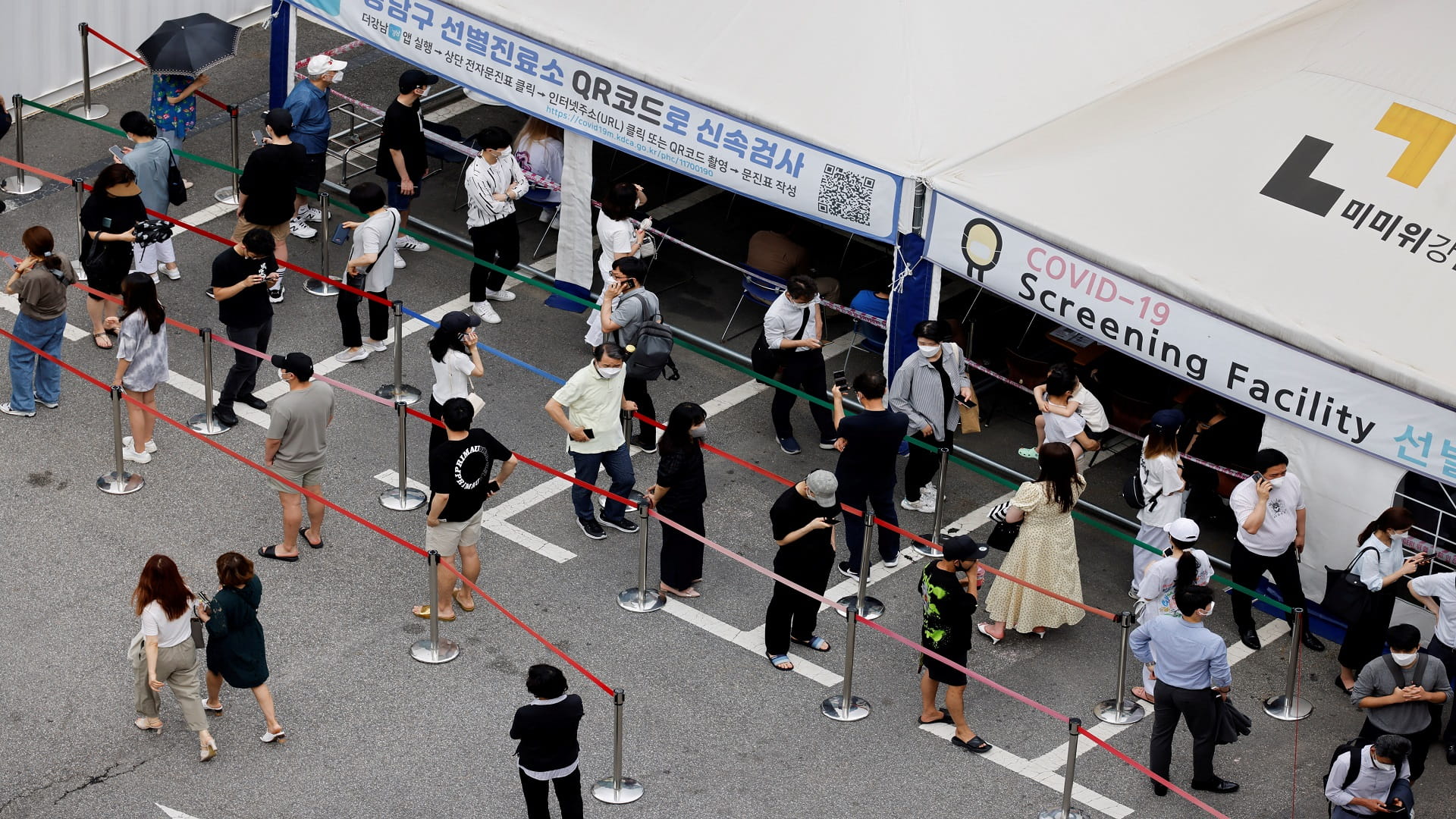 Image for the title: S.Korea reports record daily infections as Delta drives surge 