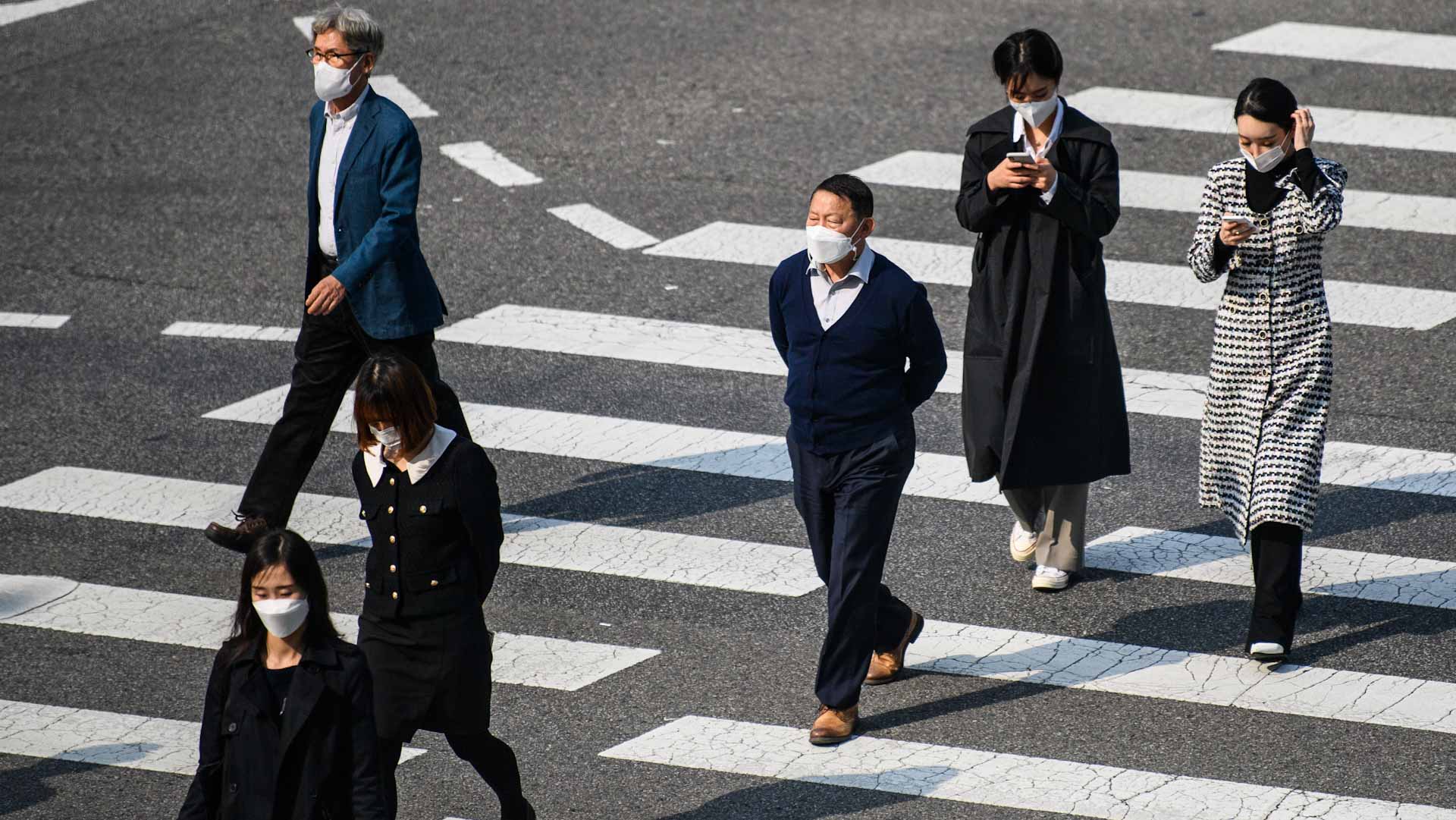 Image for the title: South Korea eases curbs, imposes vaccine passports 