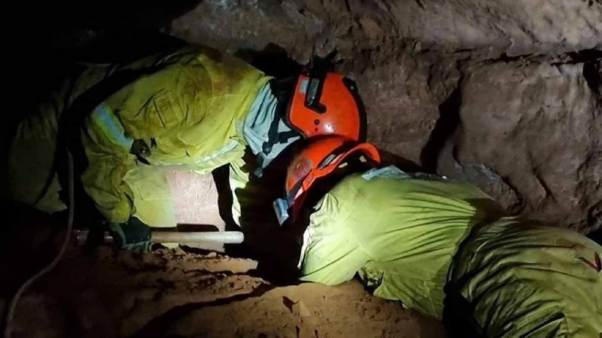 Image for the title: Nine Brazil firefighters trapped in cave collapse have died 