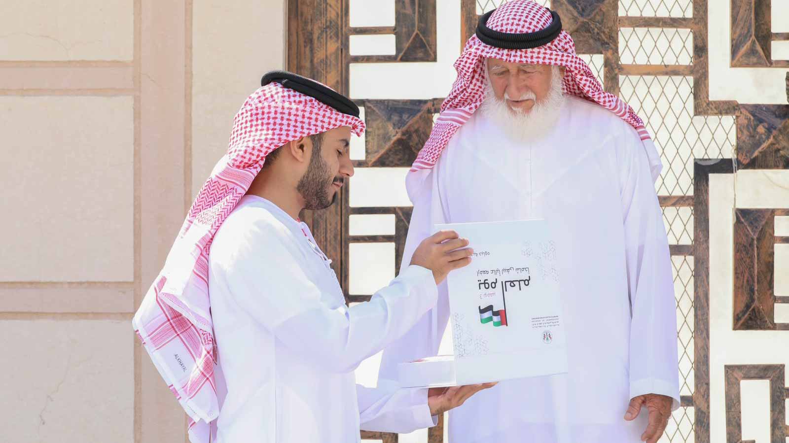 Image for the title: HSC visits residents and distributes flags to celebrate Flag Day 