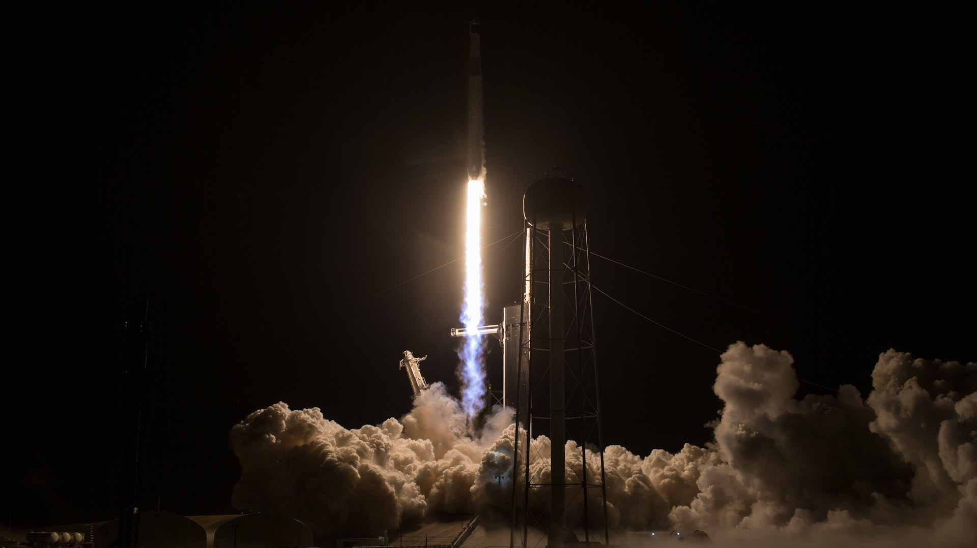 Image for the title: SpaceX capsule with crew of four docks with ISS 