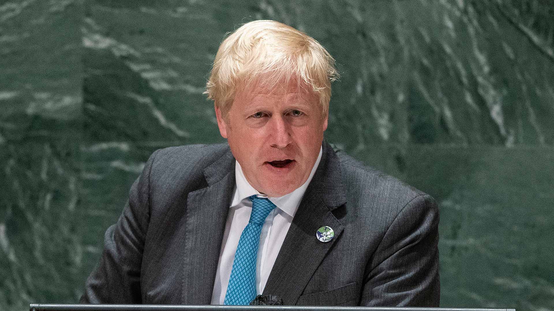 Image for the title: UK PM Johnson says no need to move to COVID "Plan B" 