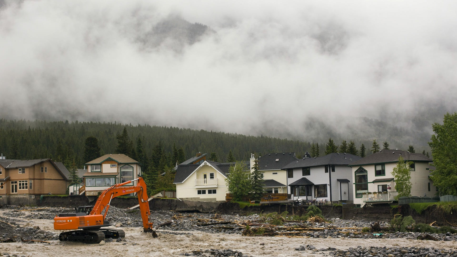 Image for the title: Heavy rains force evacuations, trap motorists in Canada 