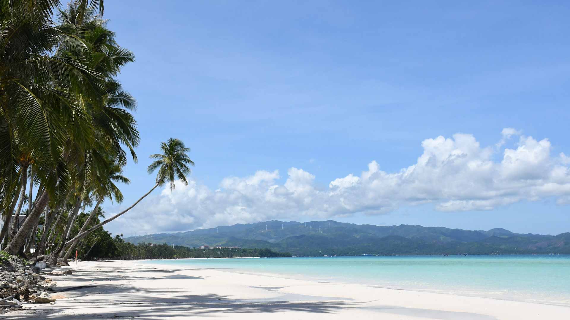 Image for the title: Philippines says planning to re-open to vaccinated tourists 